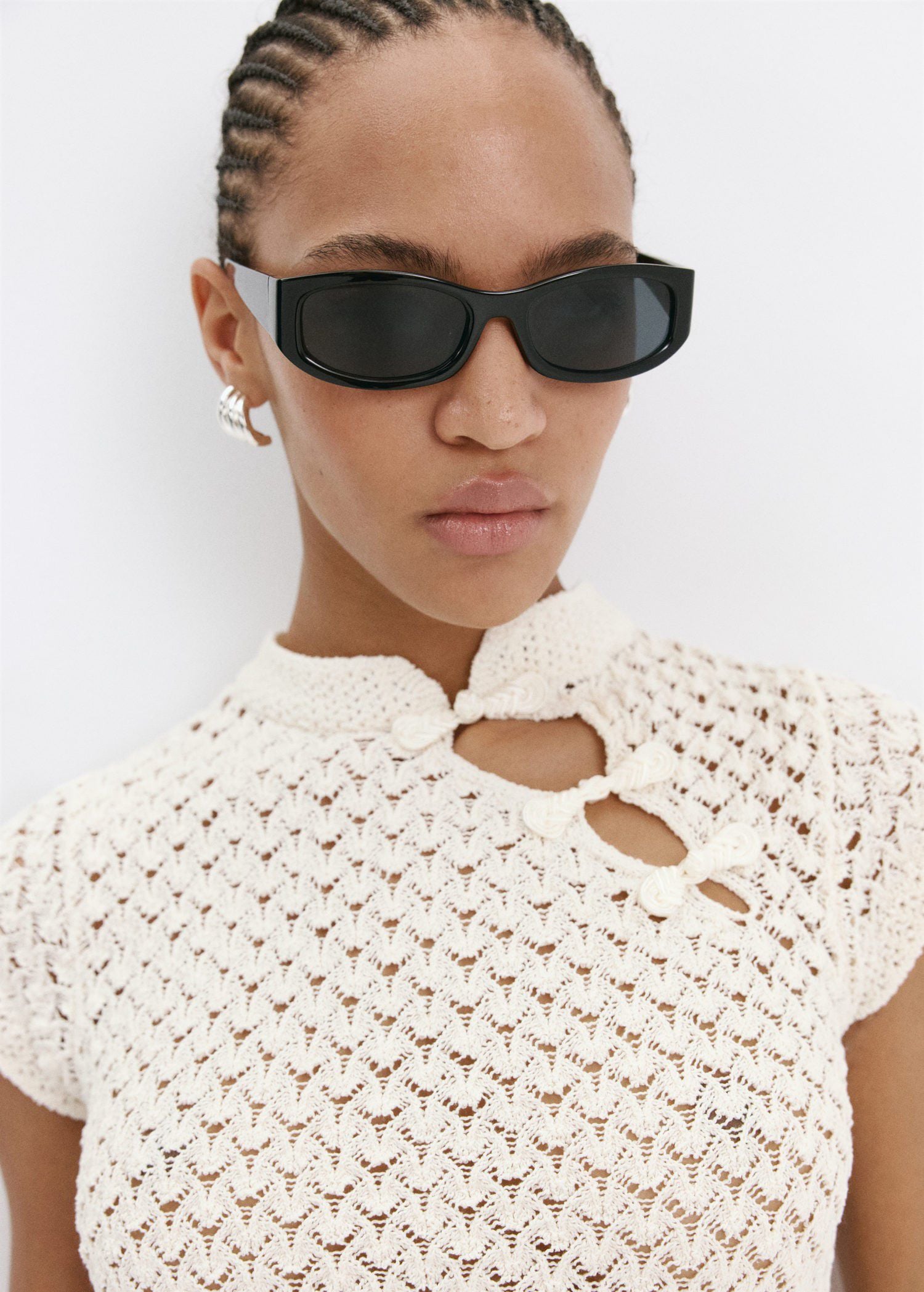 Openwork knit sweater with toggle c