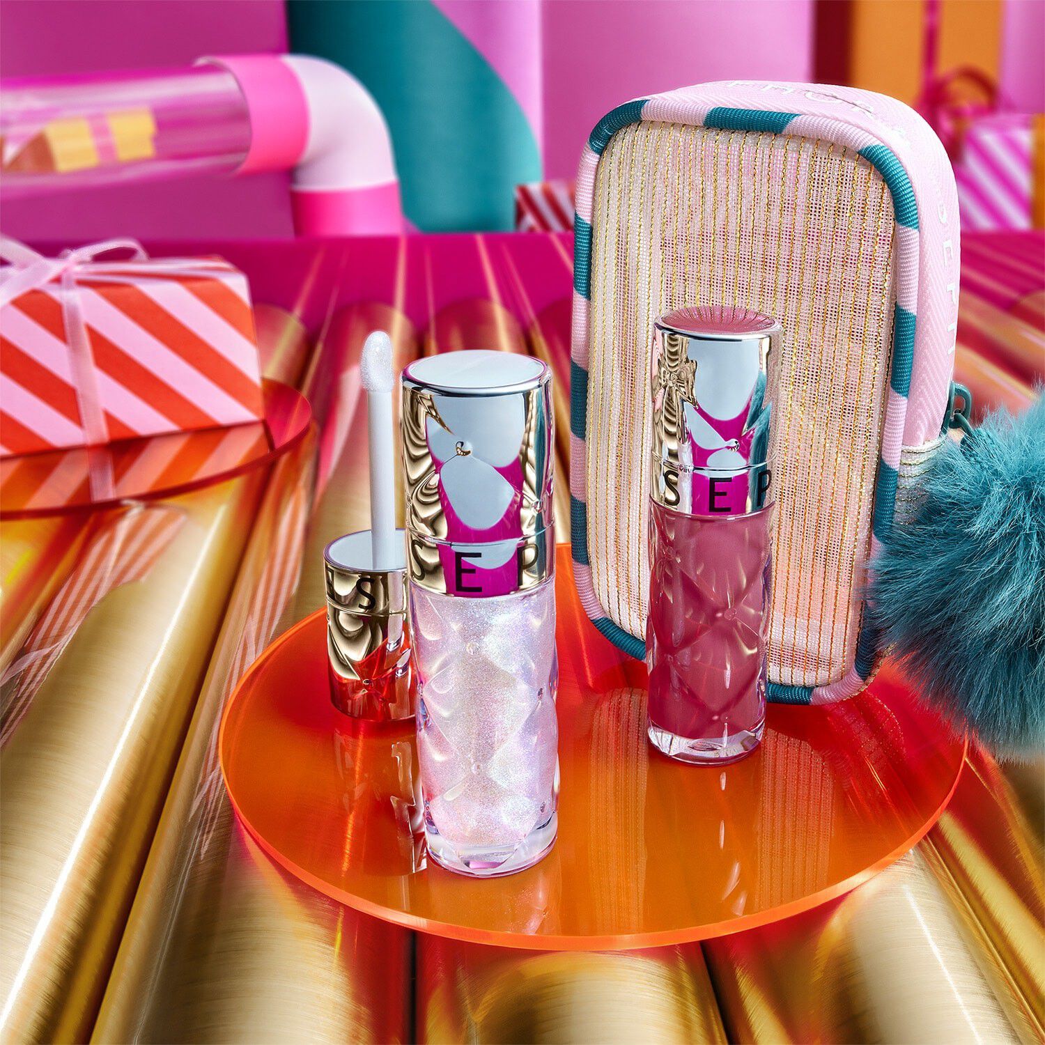 OUTRAGEOUS PLUMPING LIP GLOSS DUO - Med en nyans i begr&auml;nsad upplaga