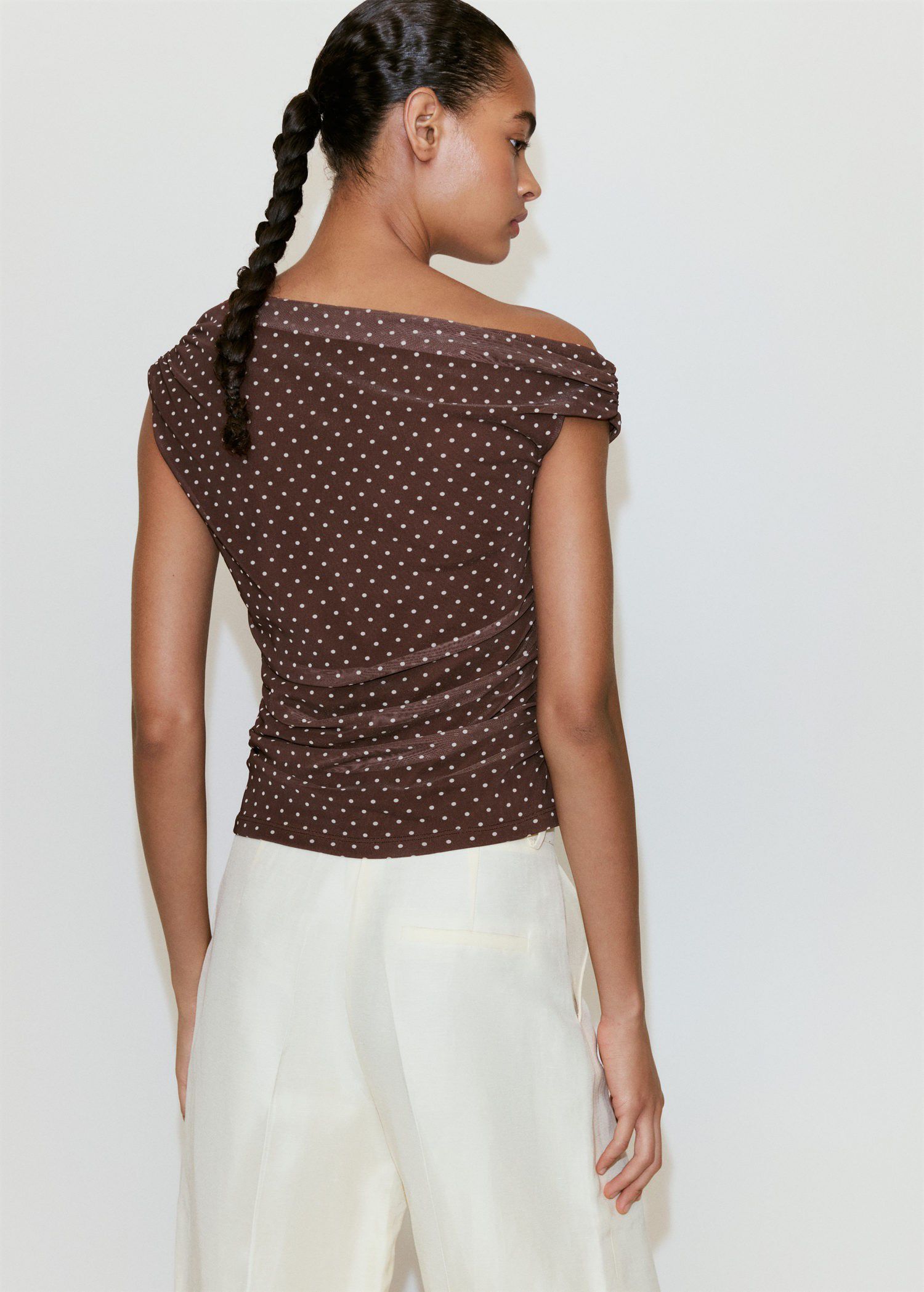 Asymmetric polka dot top