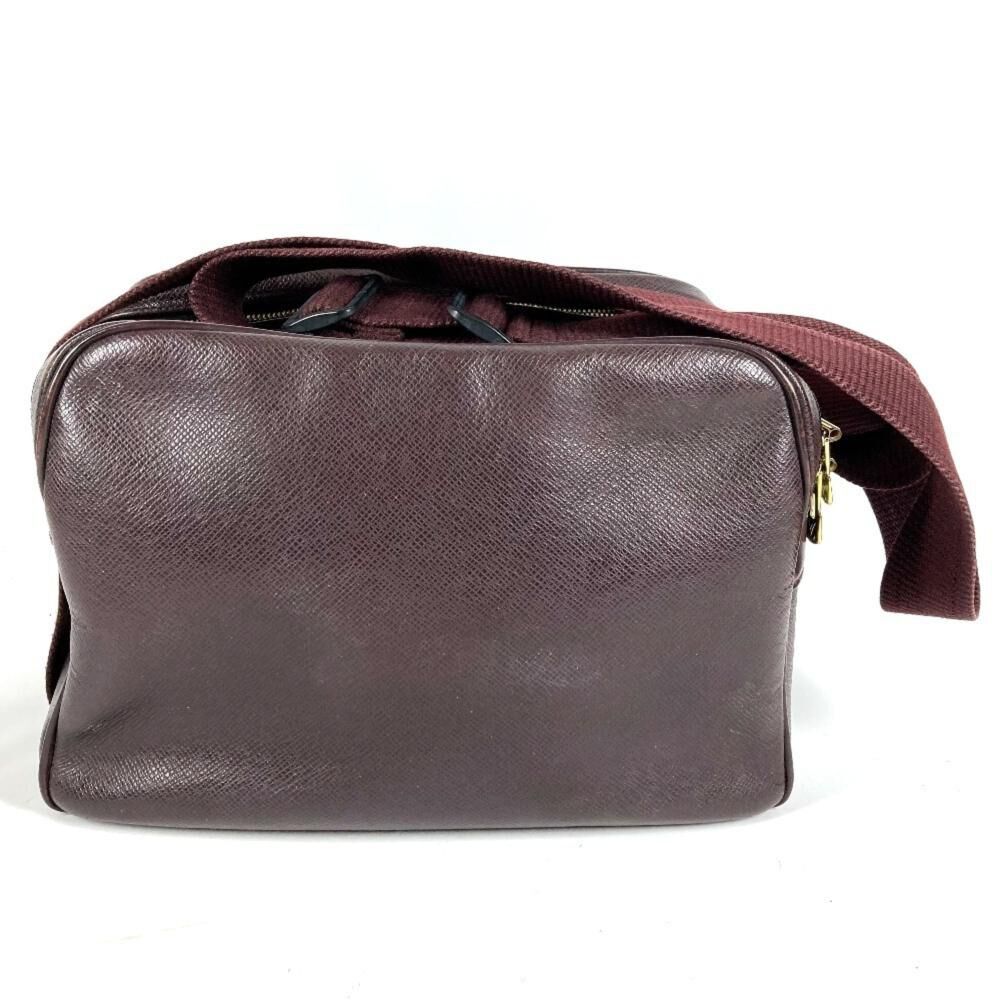 Louis Vuitton Reporter