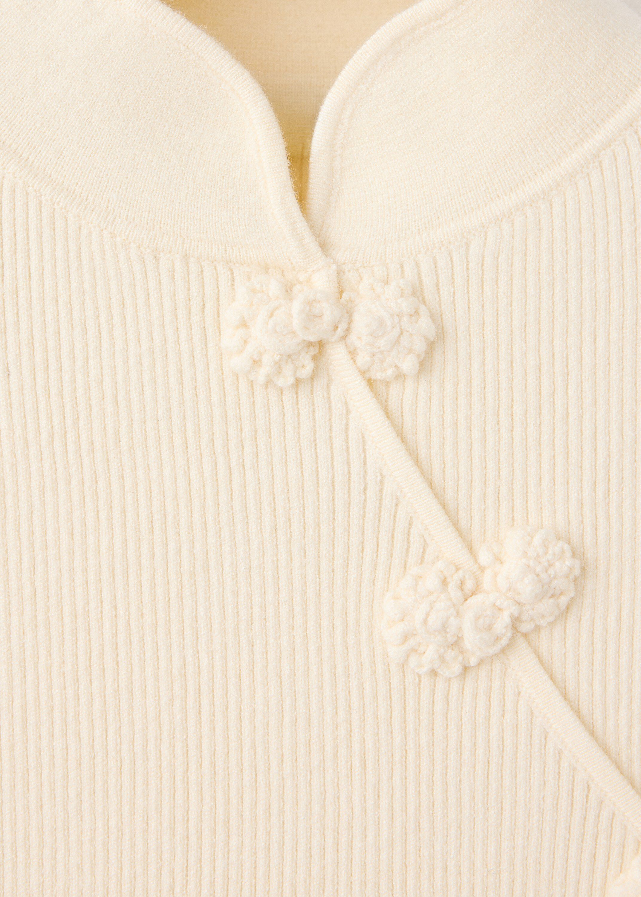 Ribbed knitted jumper with frog clo