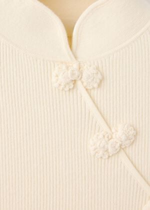 Ribbed knitted jumper with frog clo