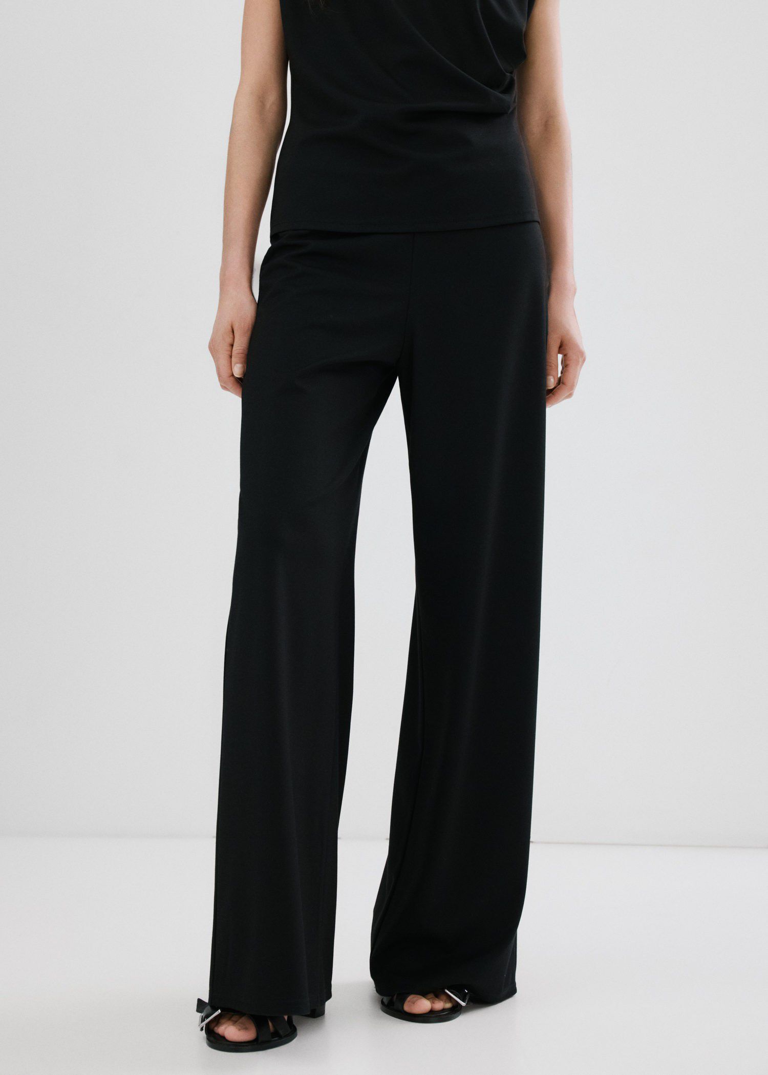 Straight-fit trousers with elastic