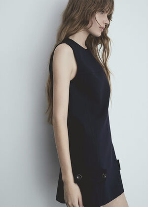 Short dress with decorative buttons