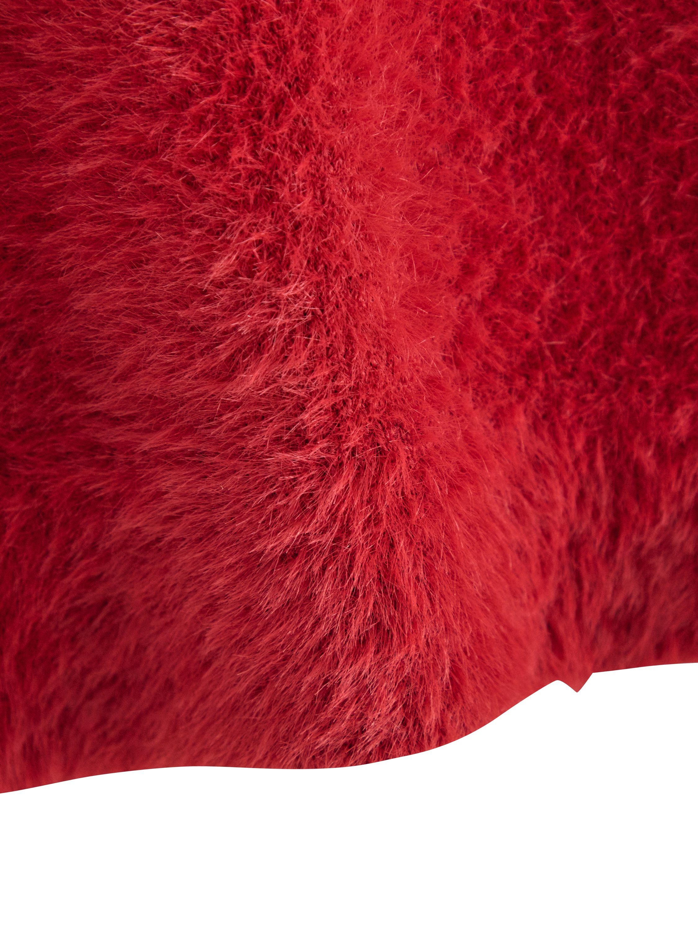 Myk kortermet topp i fj&aelig;rgarn.