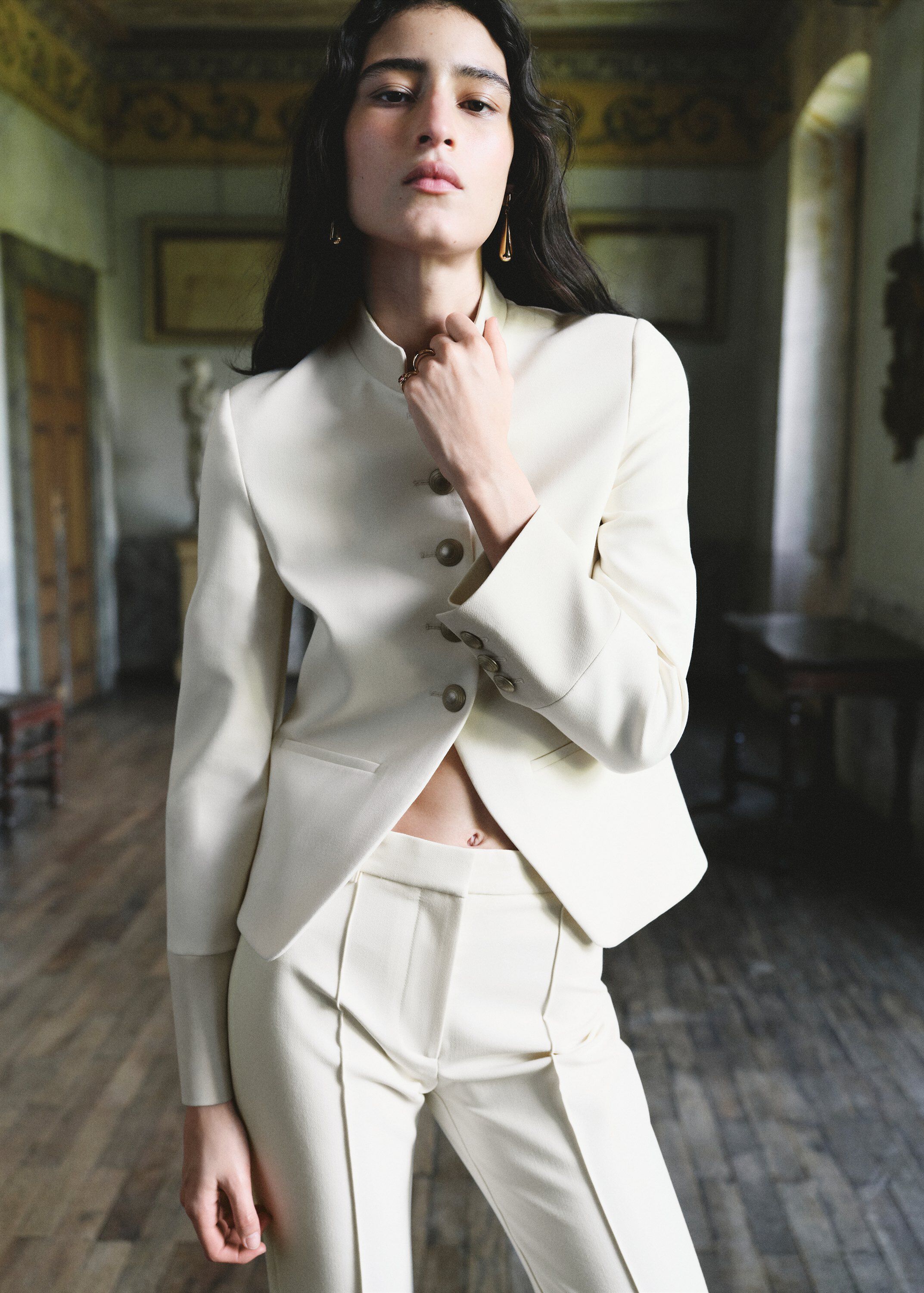 Jacket with jewel-button strip coll