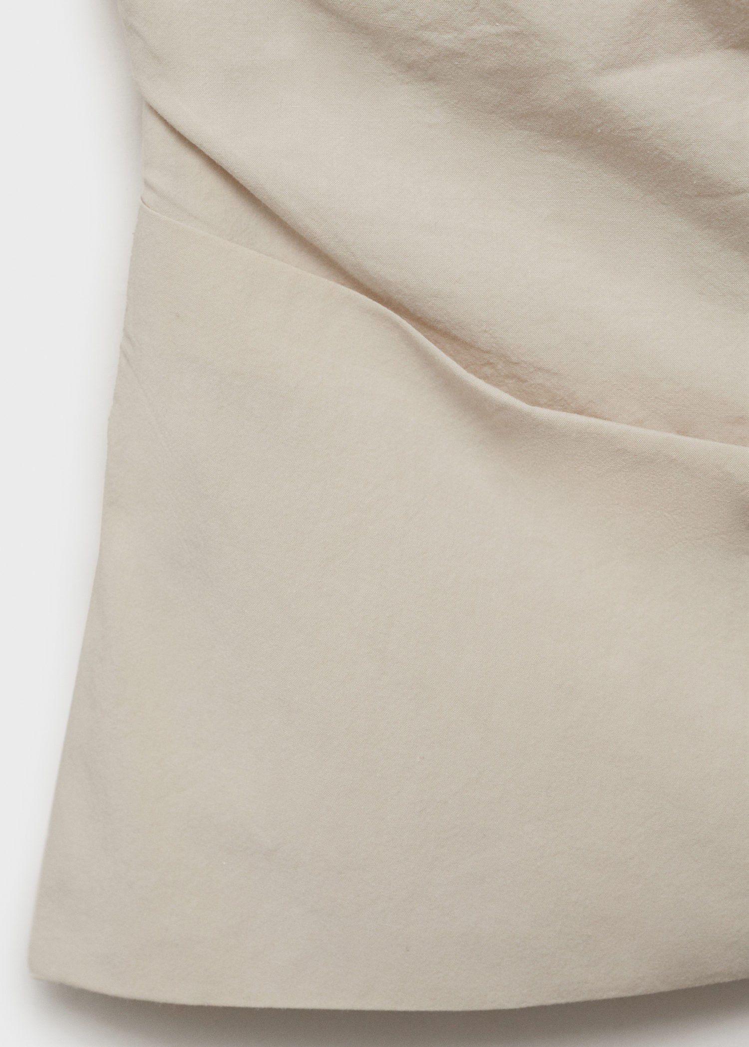 Asymmetrical strapless top