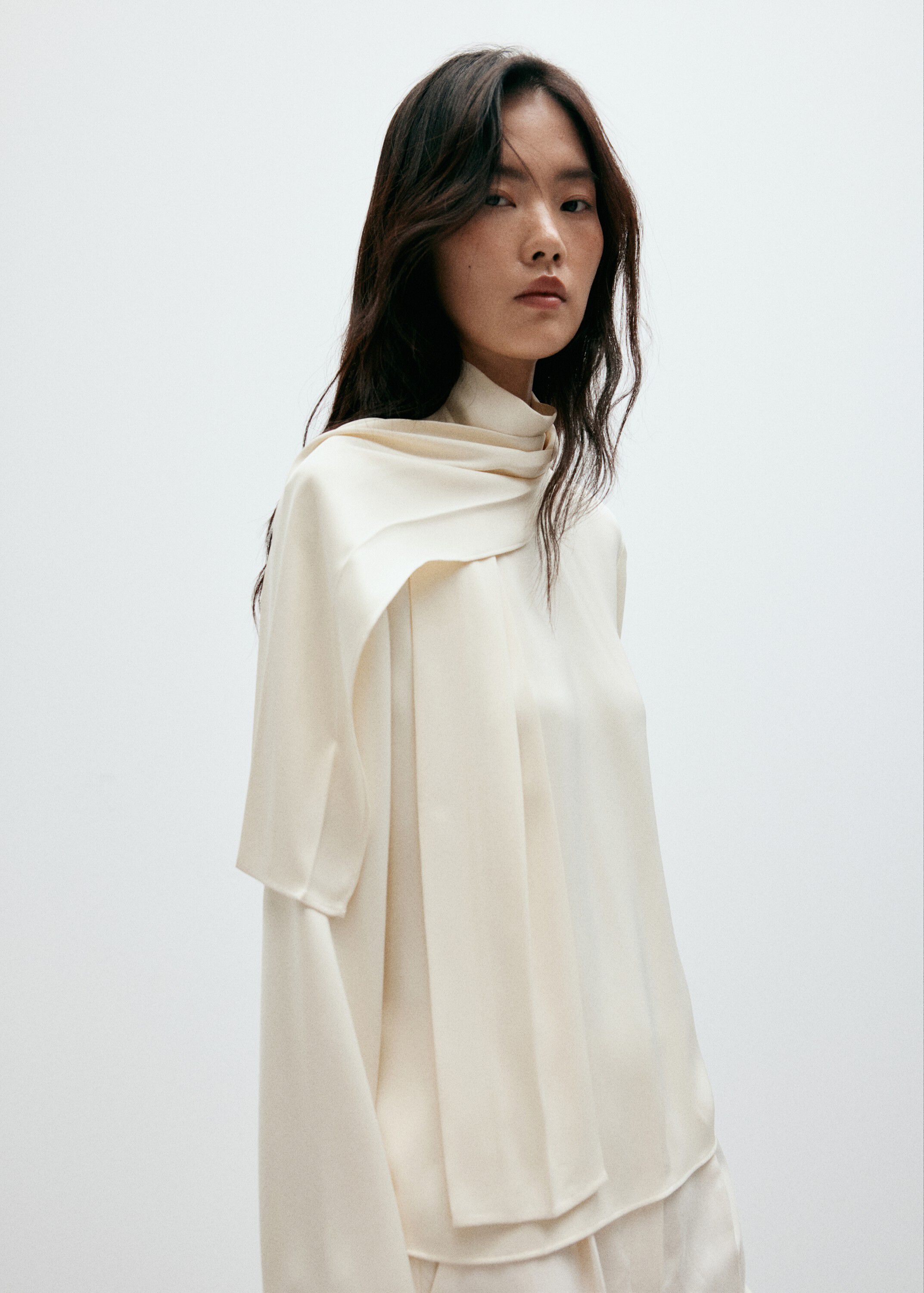 High-neck blouse with scarf detail
