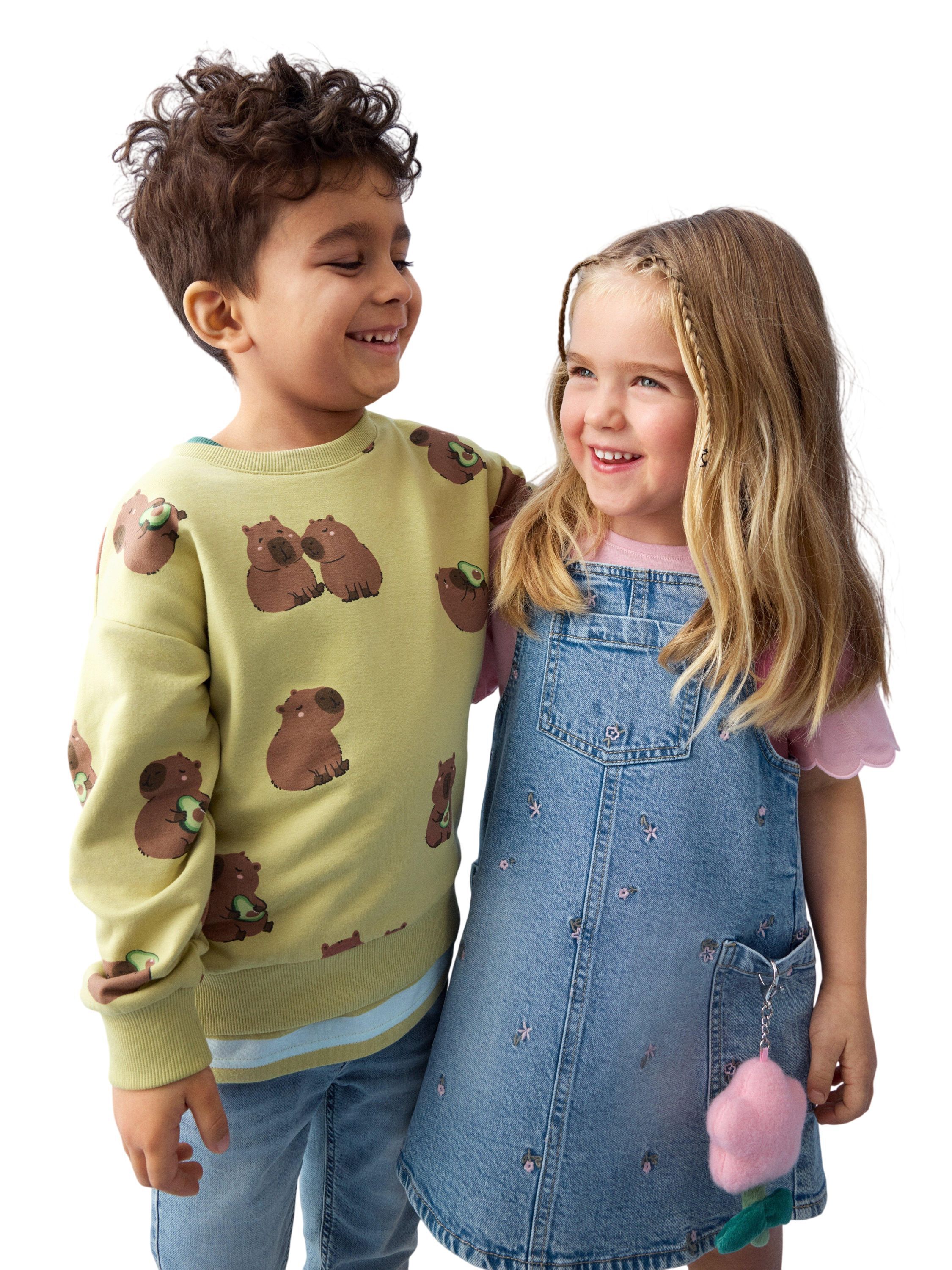 Dungaree dress in denim with embroi