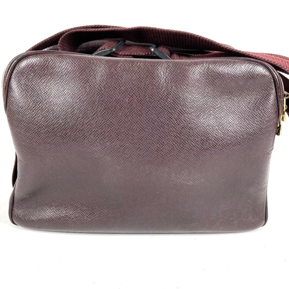 Louis Vuitton Reporter