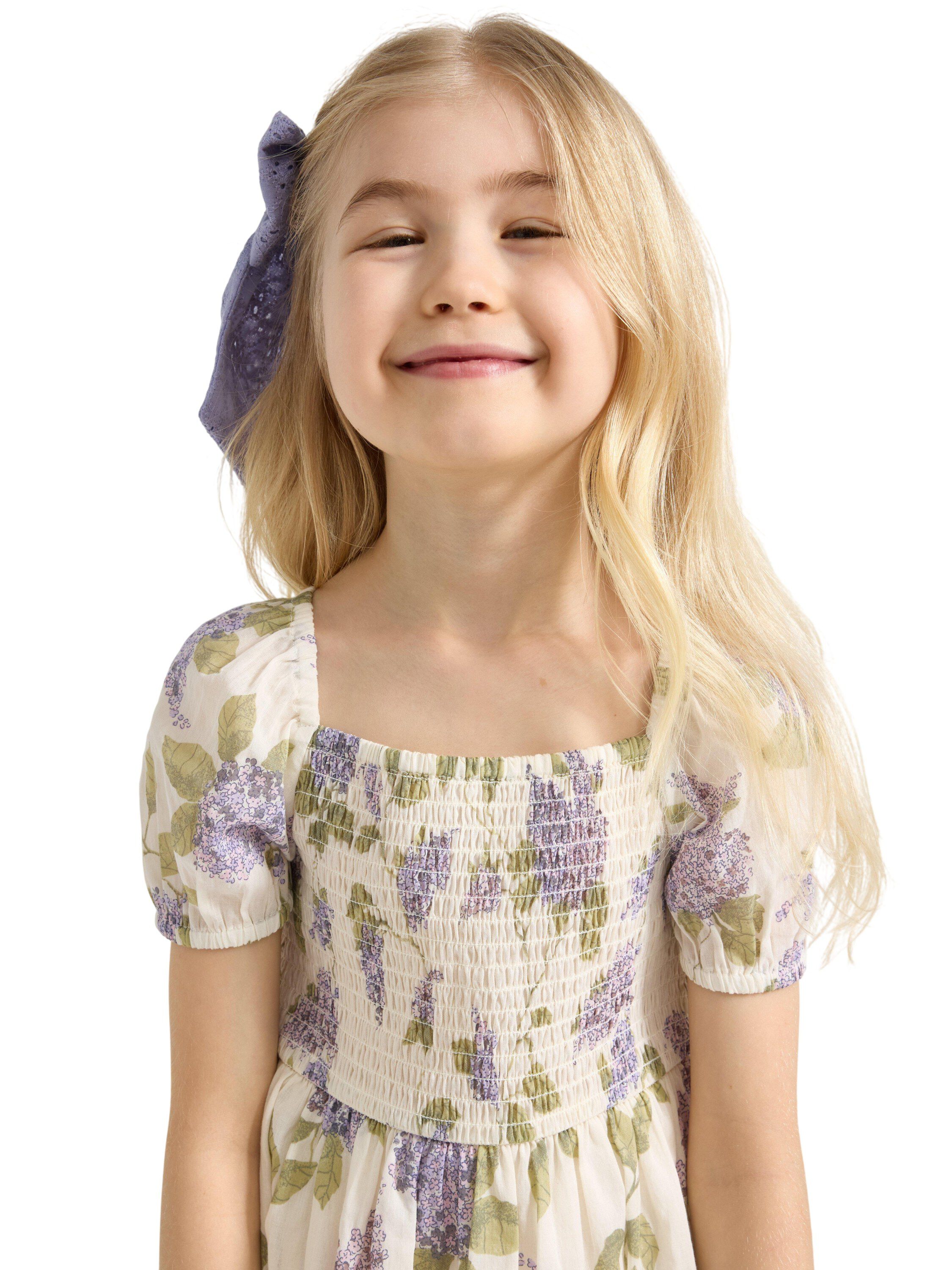 Dress with smock at the top and a s