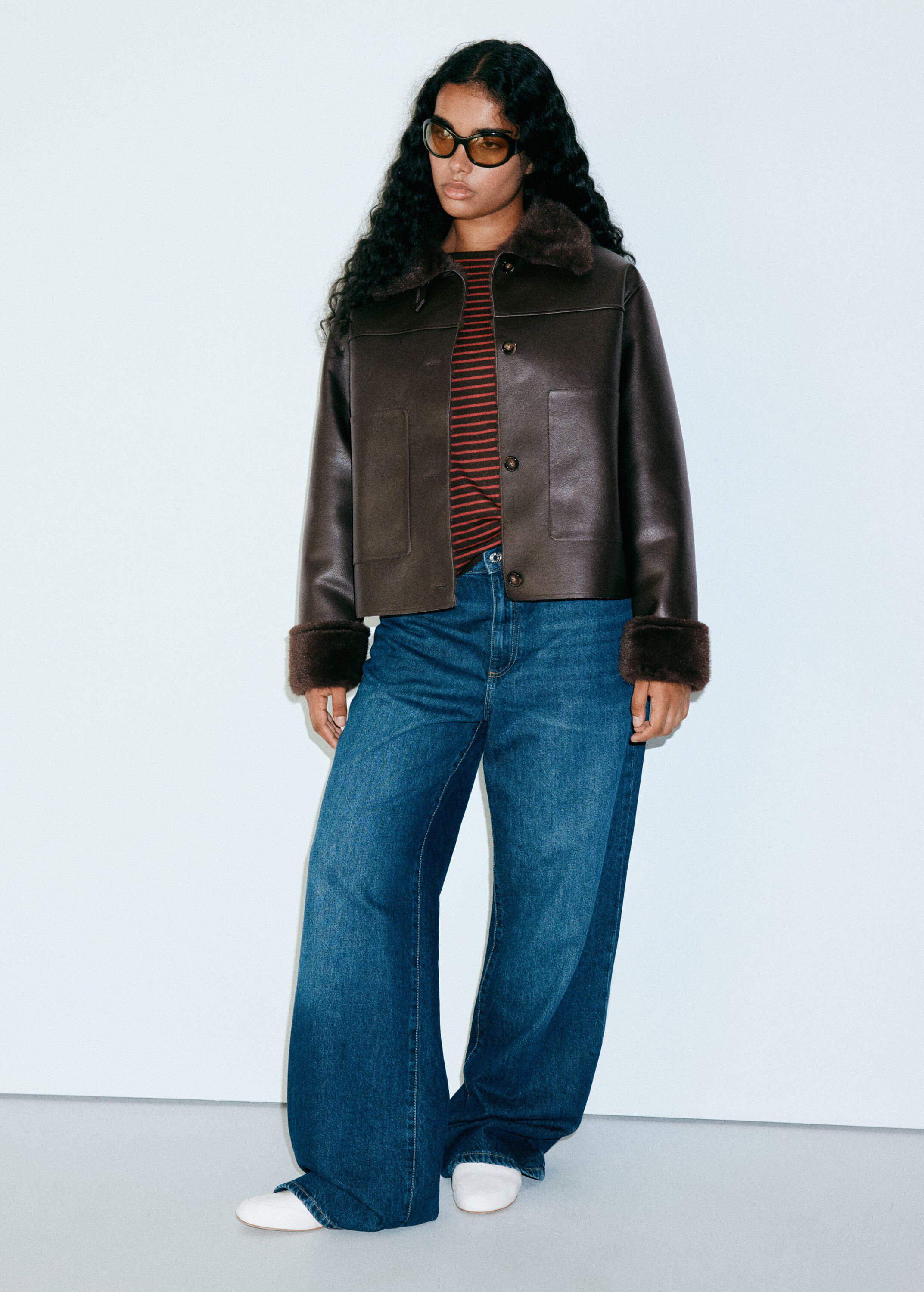 Faux leather jacket with fur trim