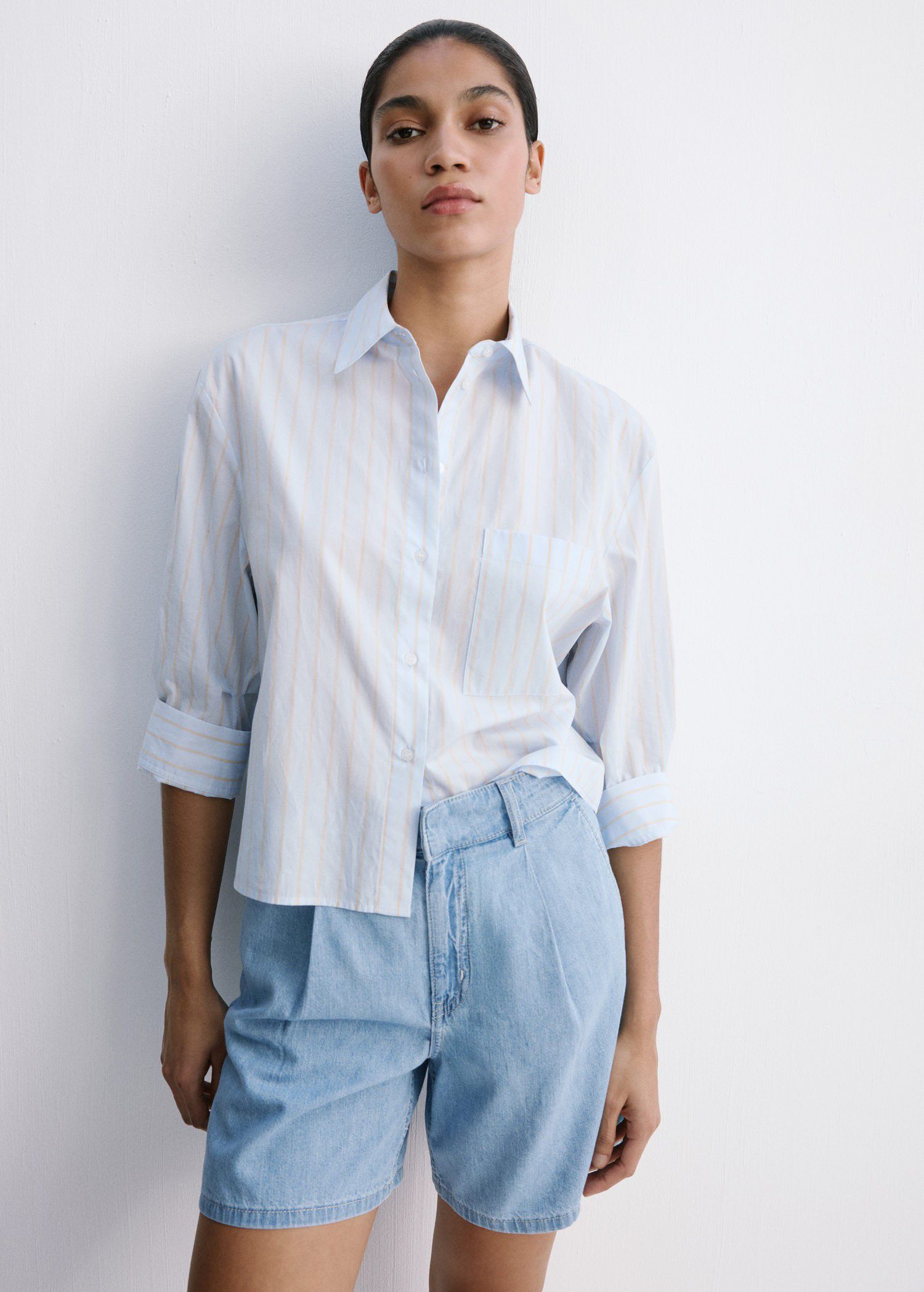 Mid-rise denim bermuda shorts with