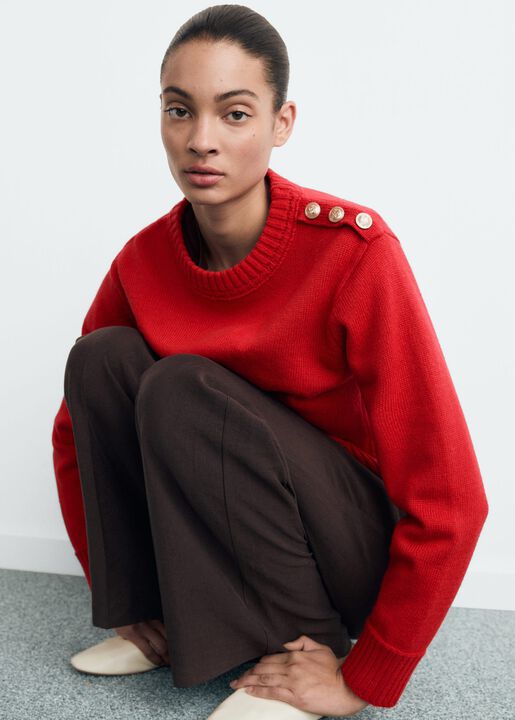 Knitted sweater with jewel buttons