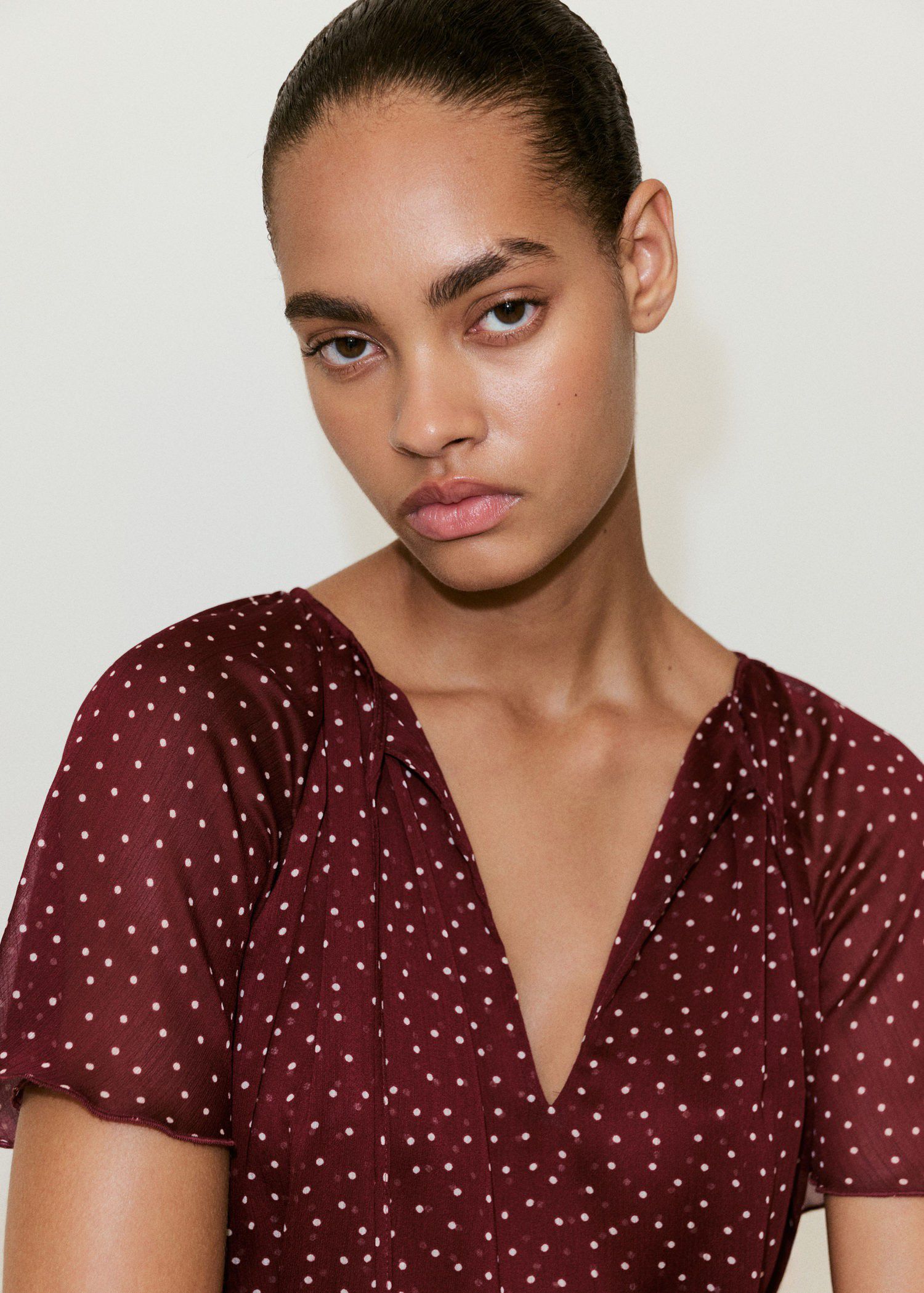 Bow polka-dot blouse