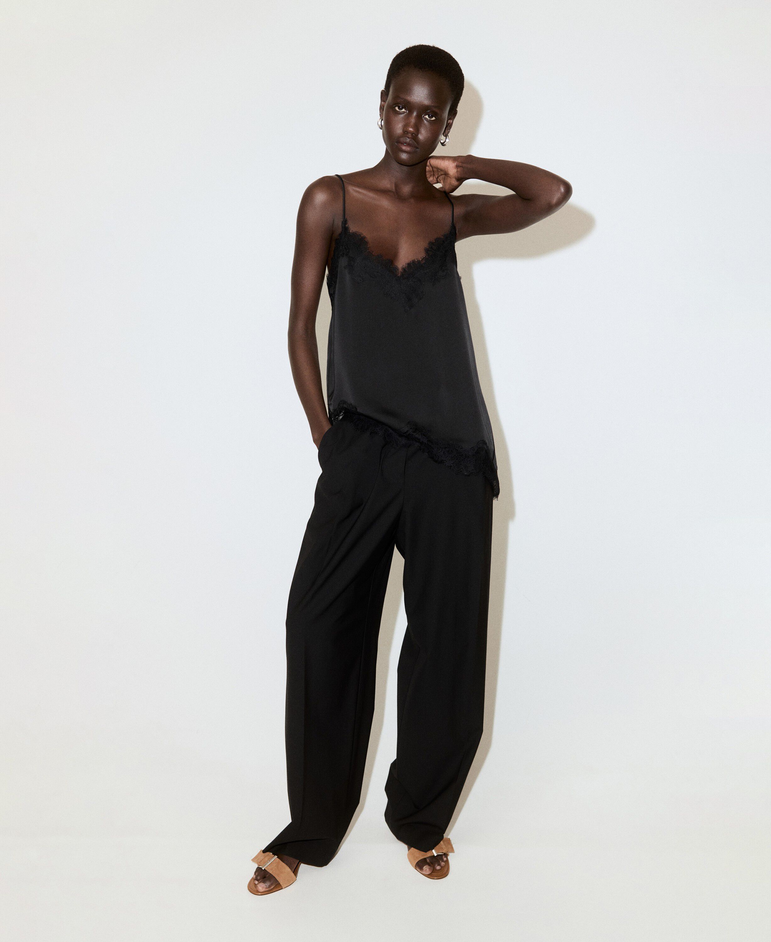 Asymmetric lace camisole top