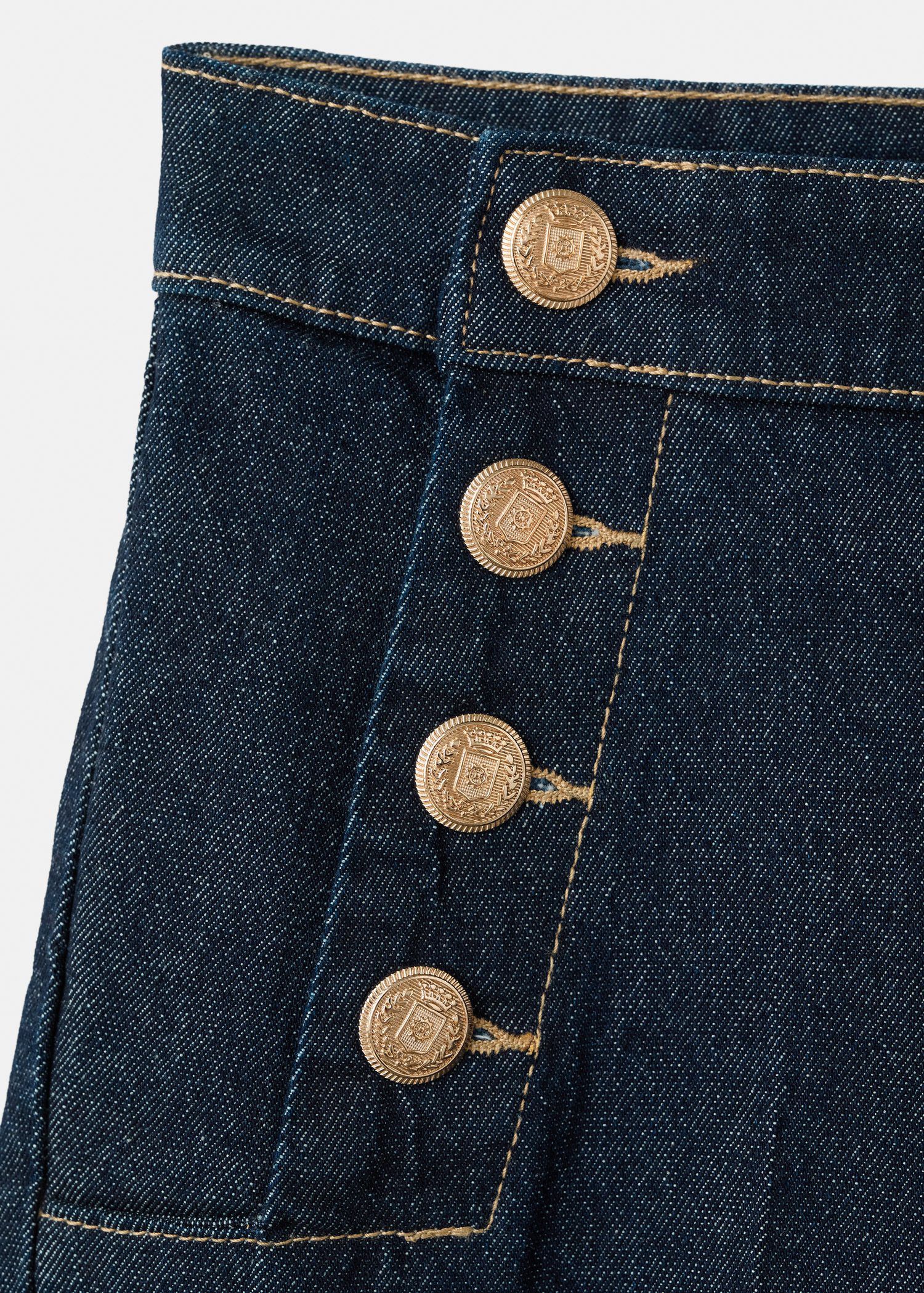 Wide-leg jeans with side buttons