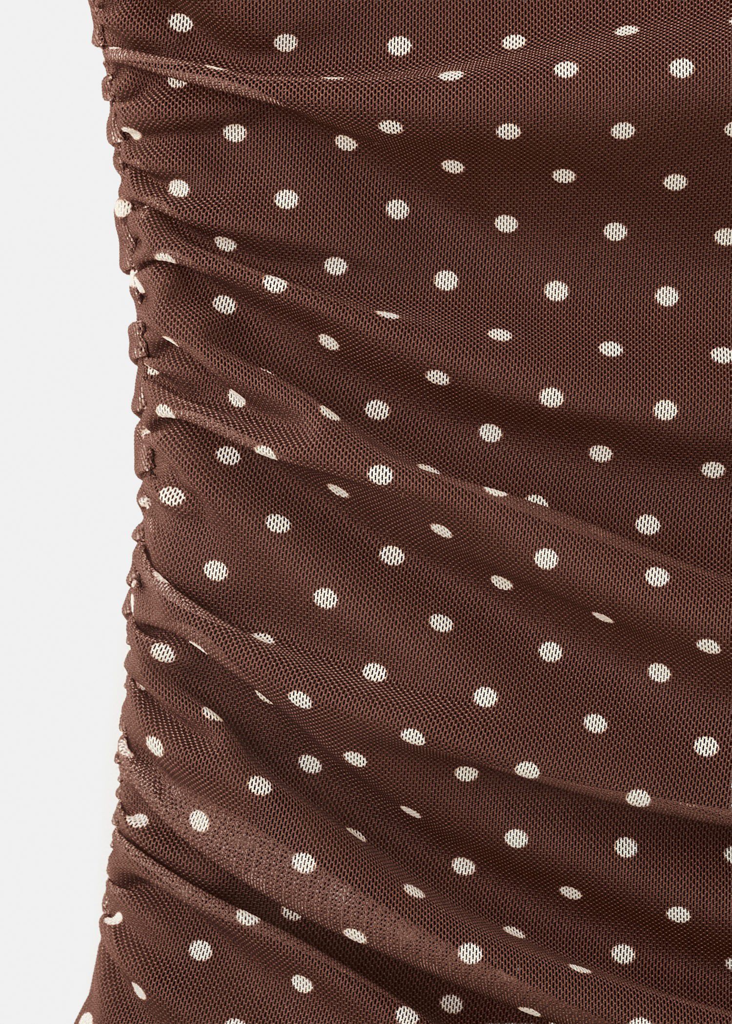 Asymmetric polka dot top