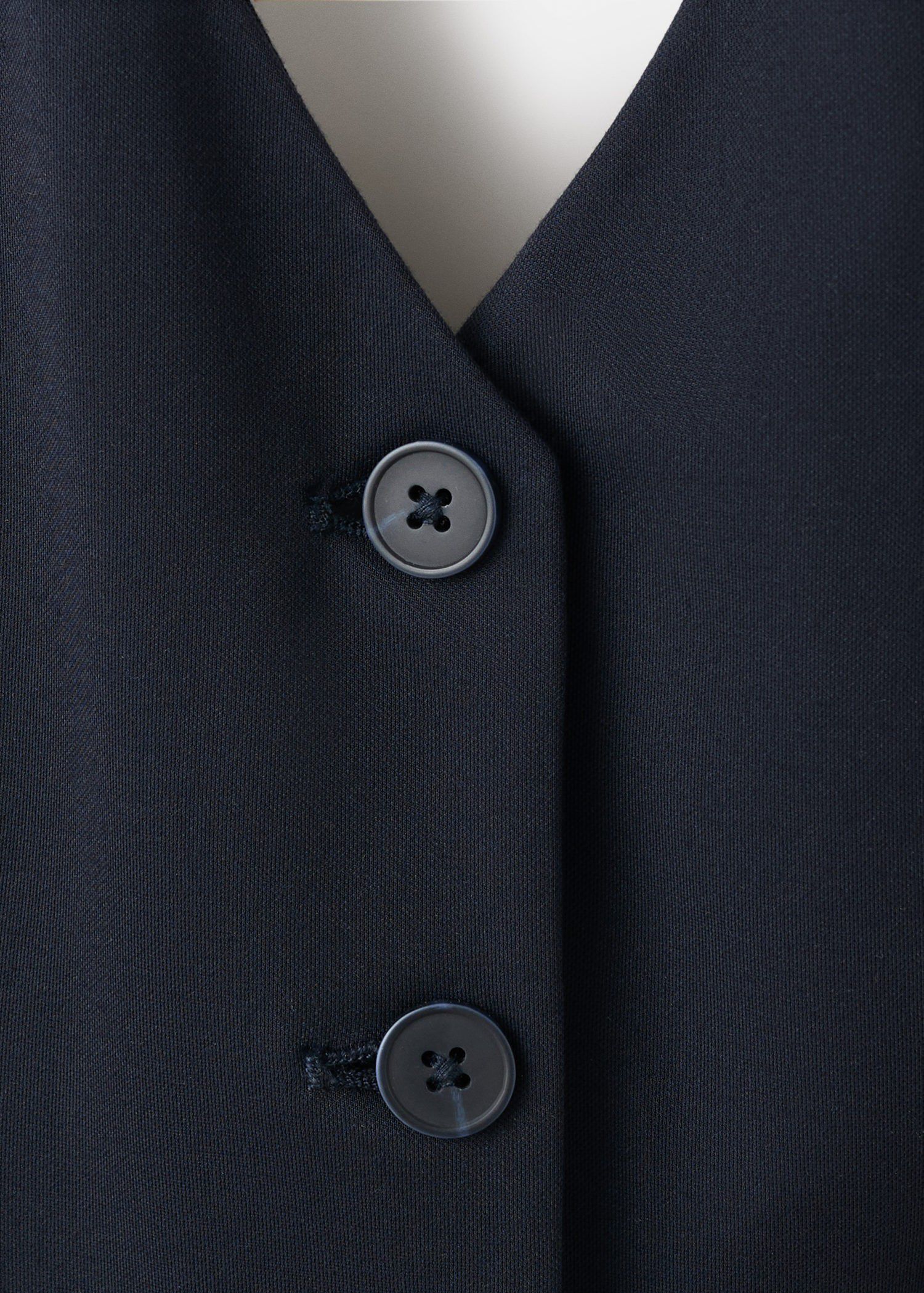 Halter-neck gilet with buttons