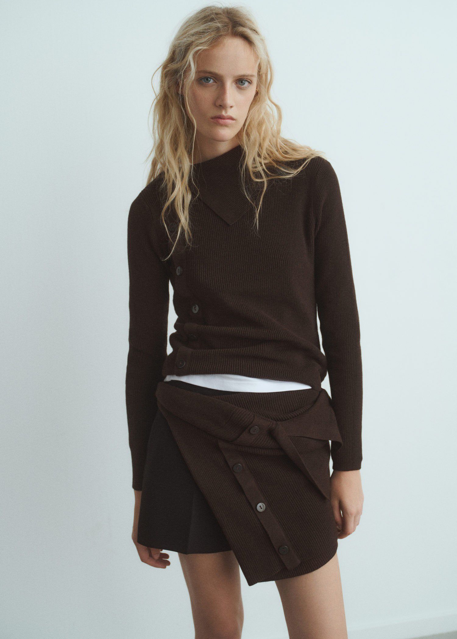 Sweater with asymmetrical neck and