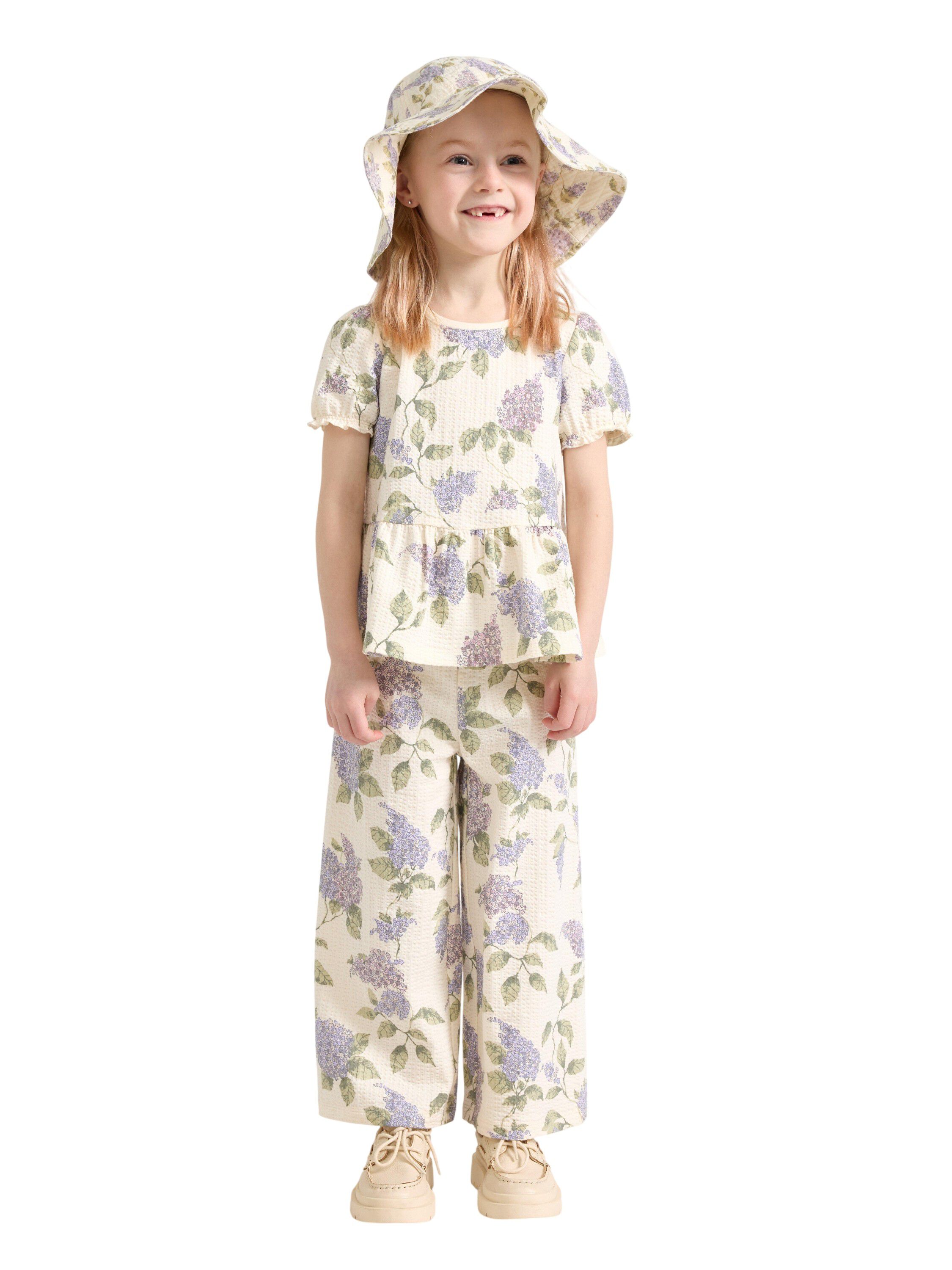 Short-sleeved top with peplum fit a