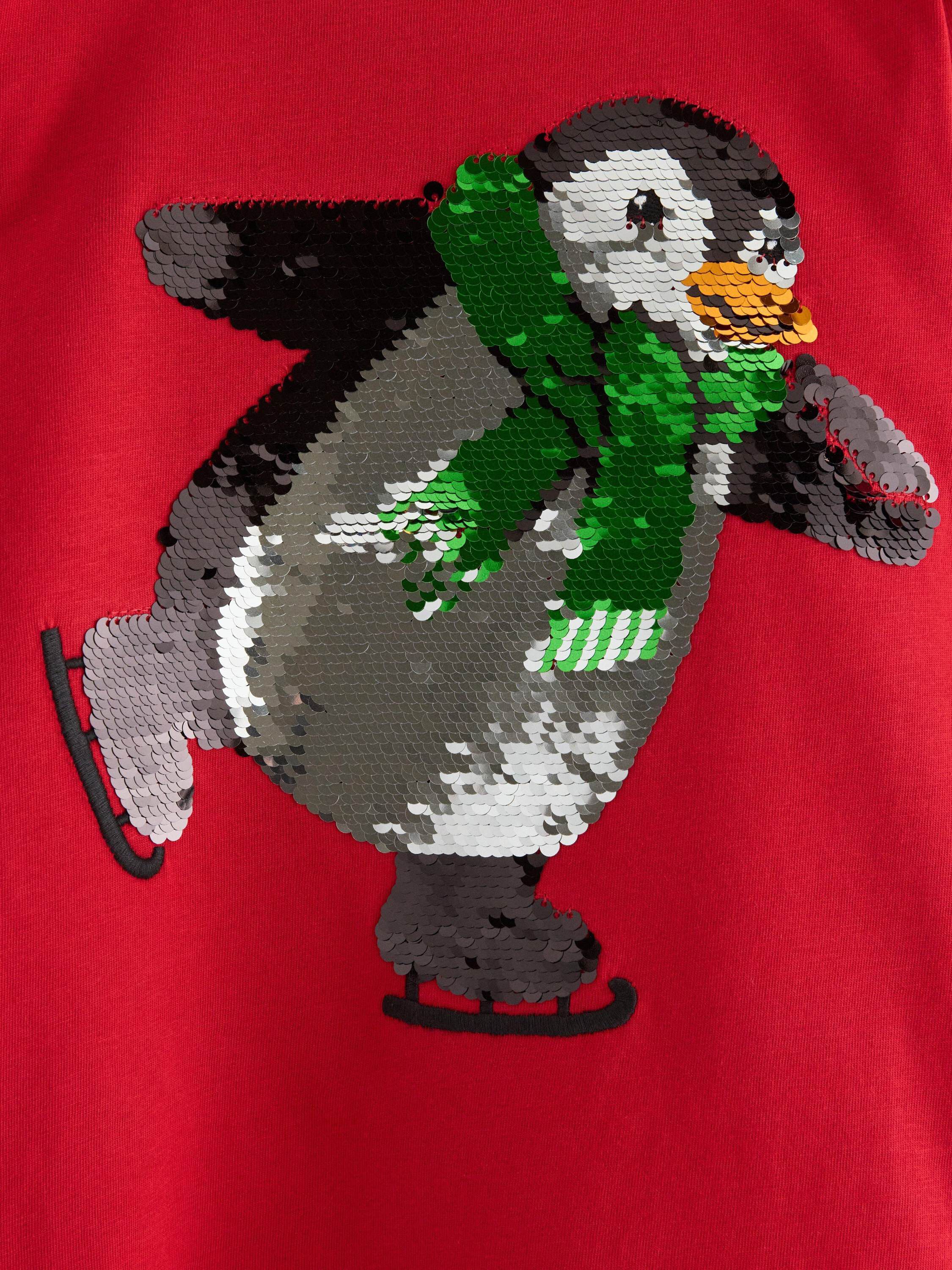 Long-sleeved jersey top with a reve