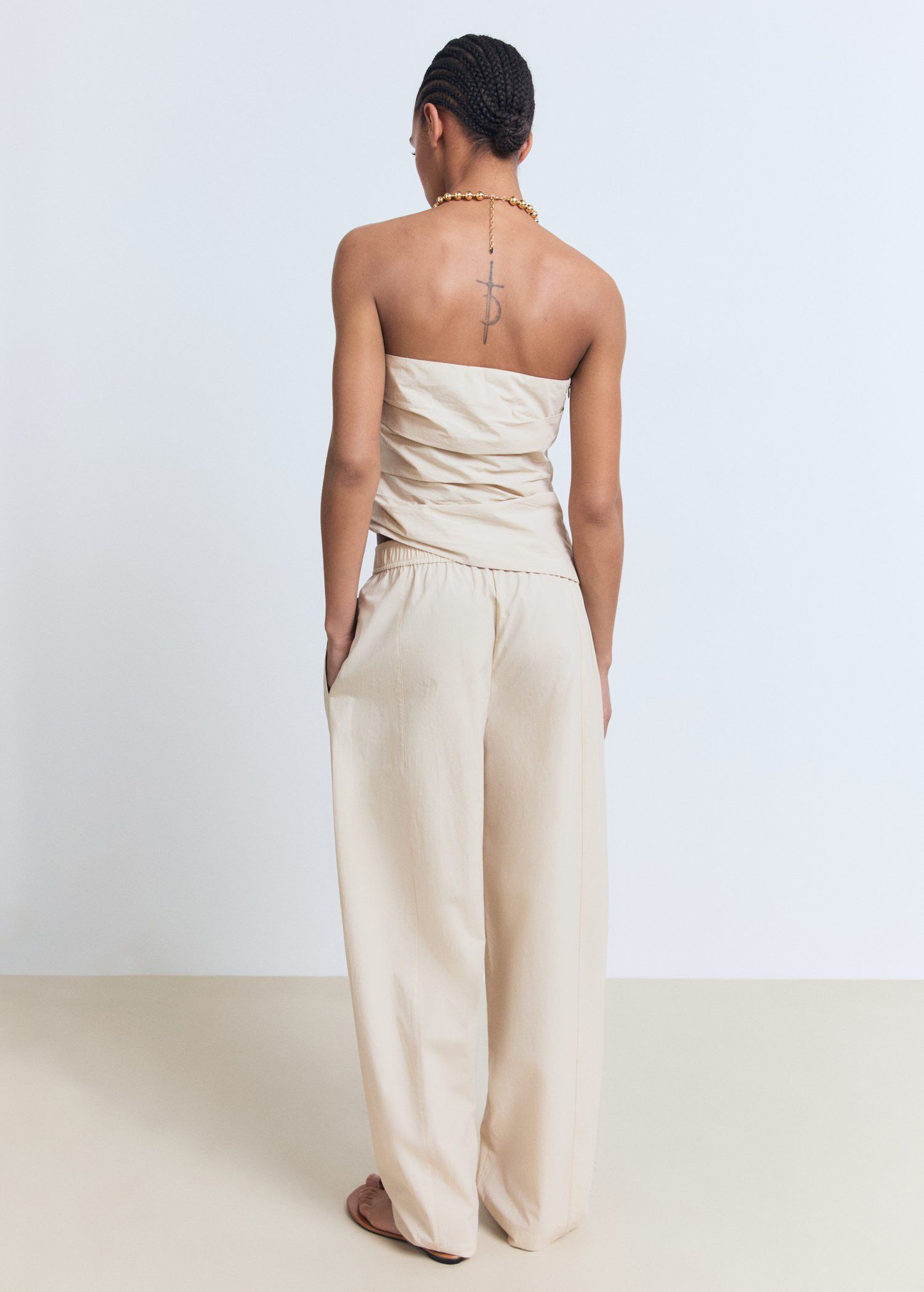 Asymmetrical strapless top