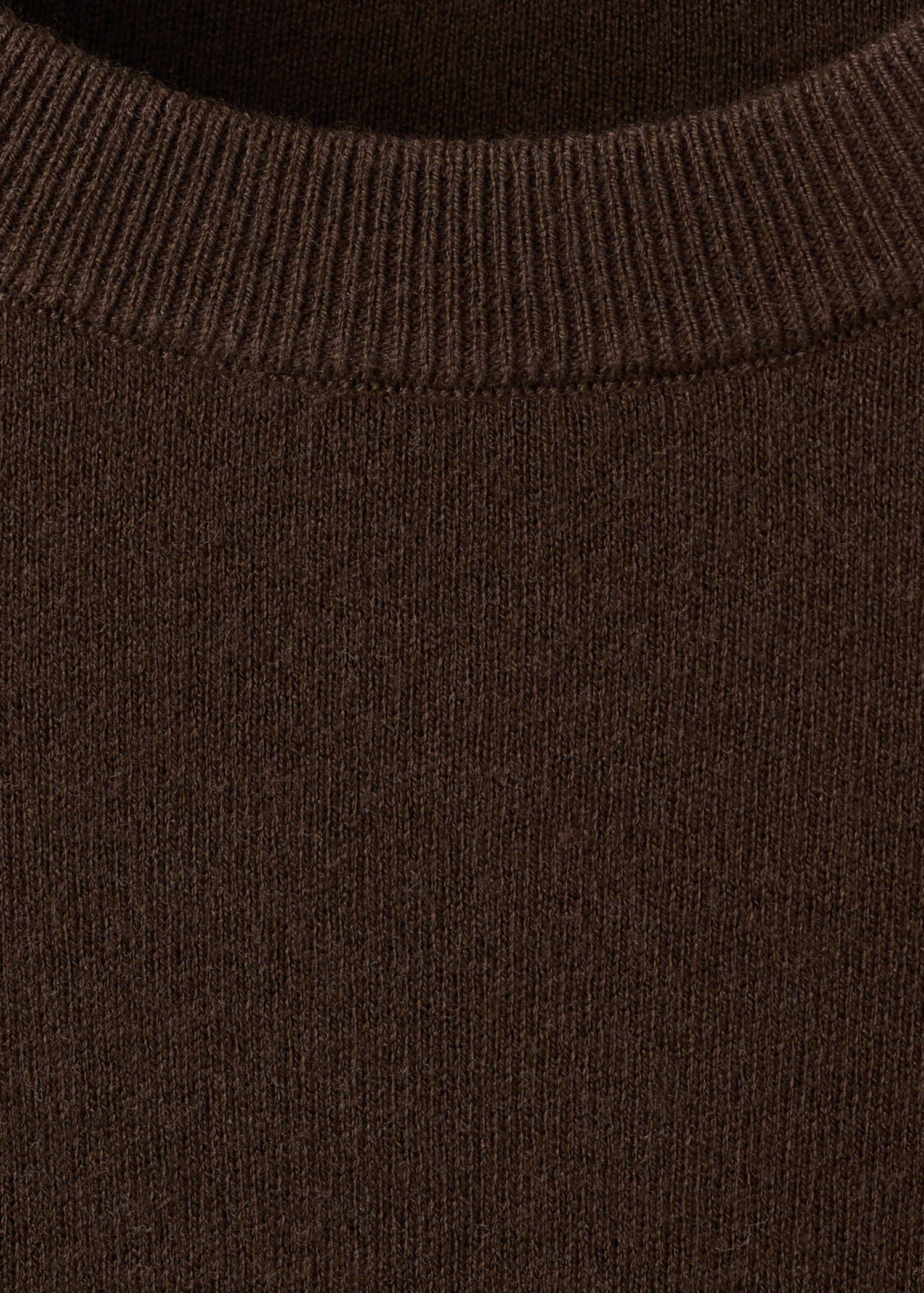 long lace-trimmed sweater