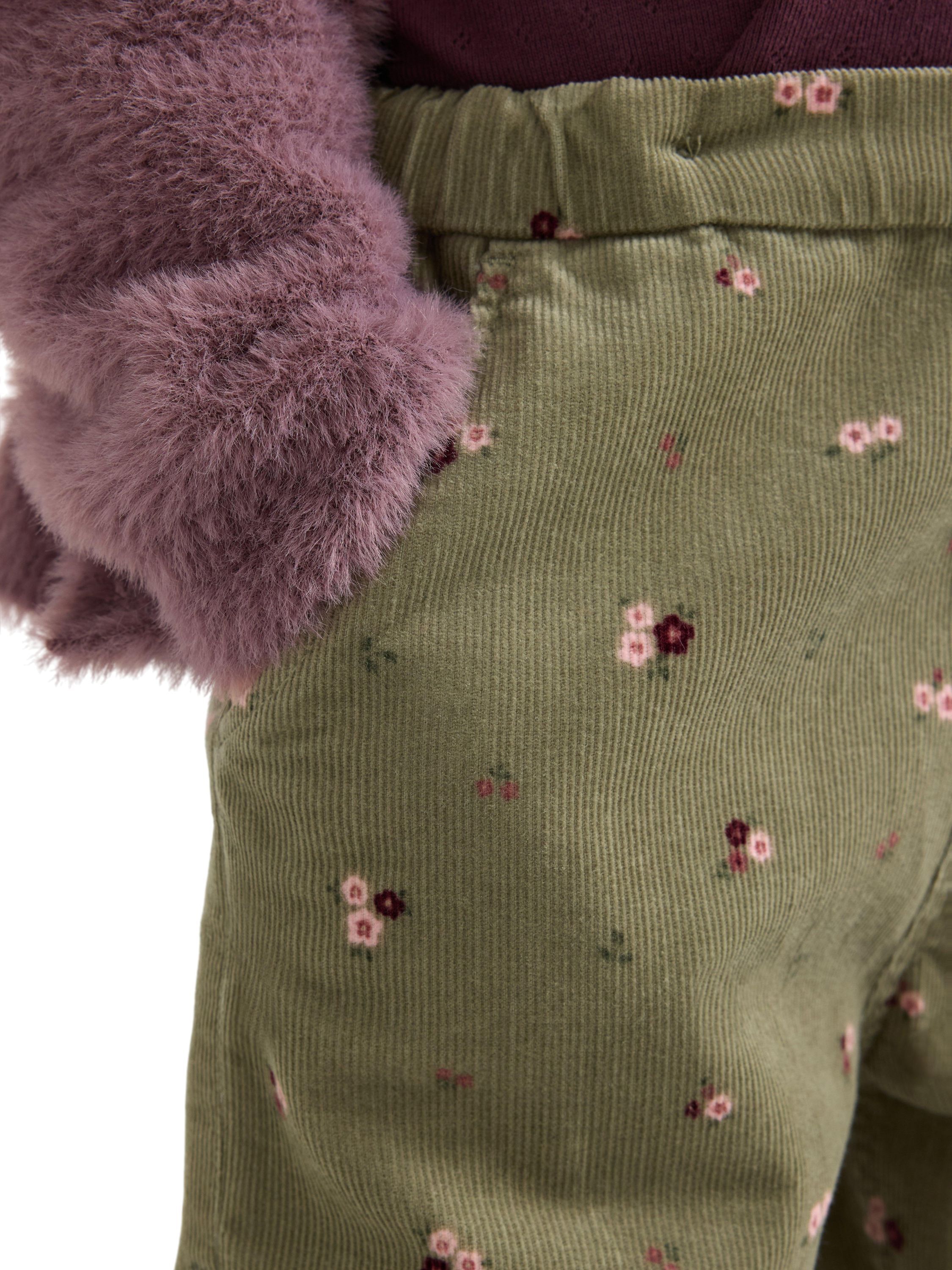 Bl&oslash;de bukser i fl&oslash;jl med et held�