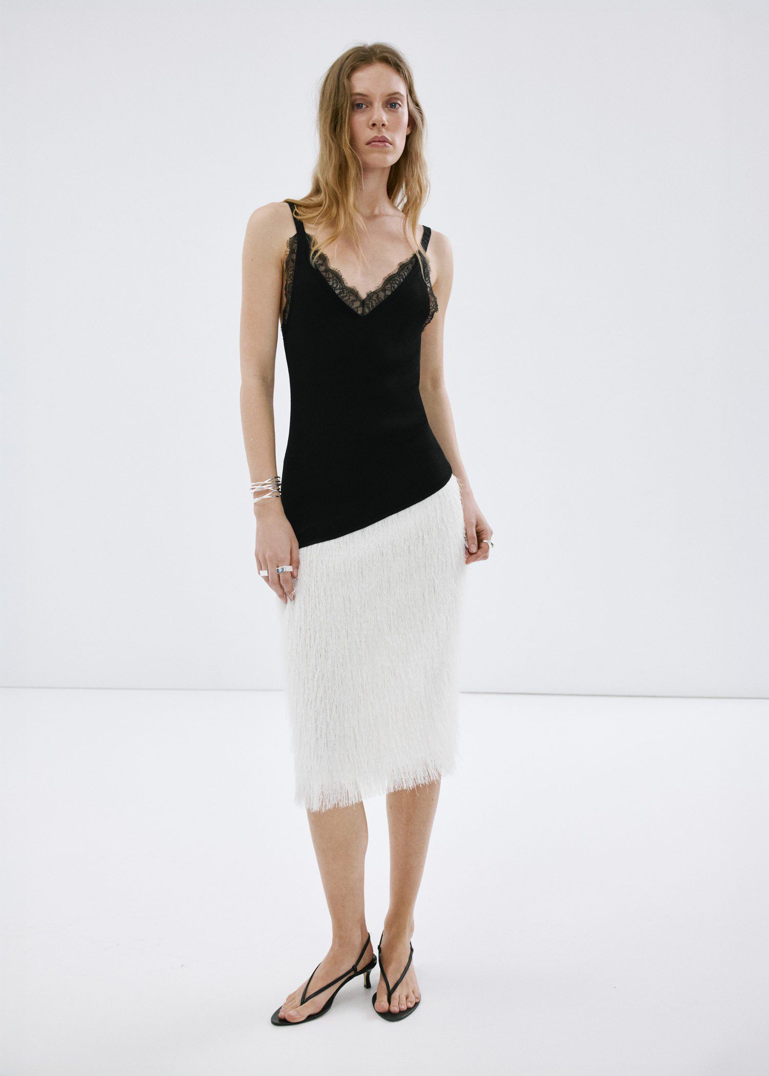 Asymmetrical lace-trimmed top