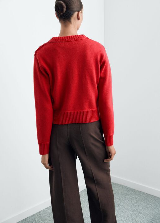 Knitted sweater with jewel buttons