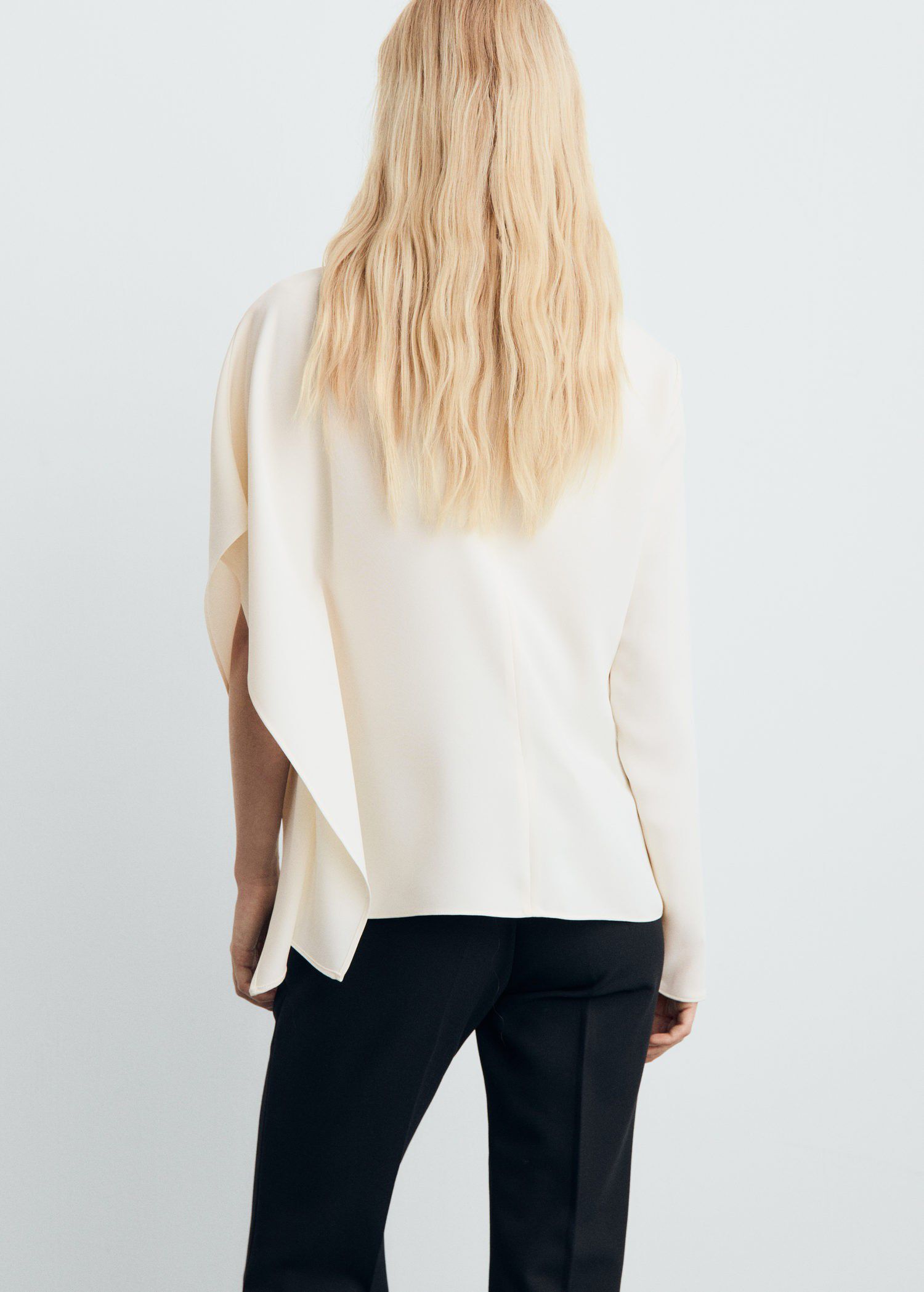 High-neck blouse with asymmetrical