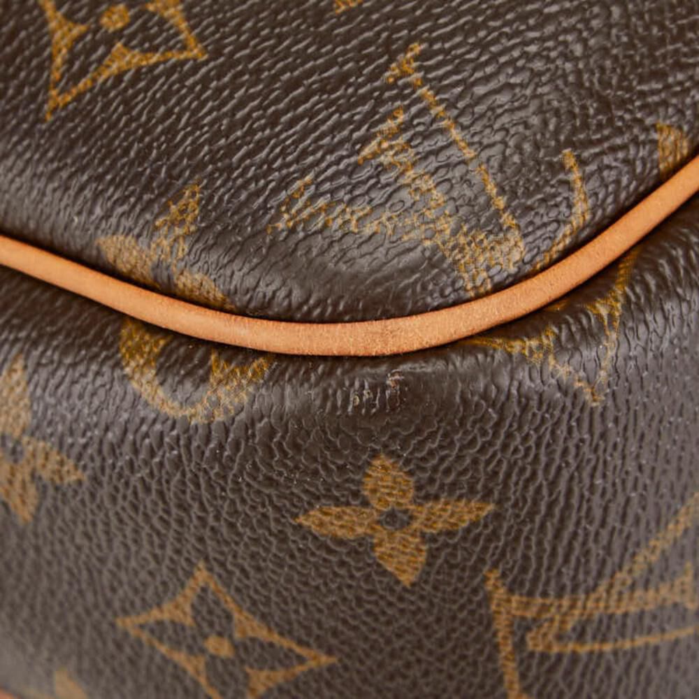 Louis Vuitton Reporter