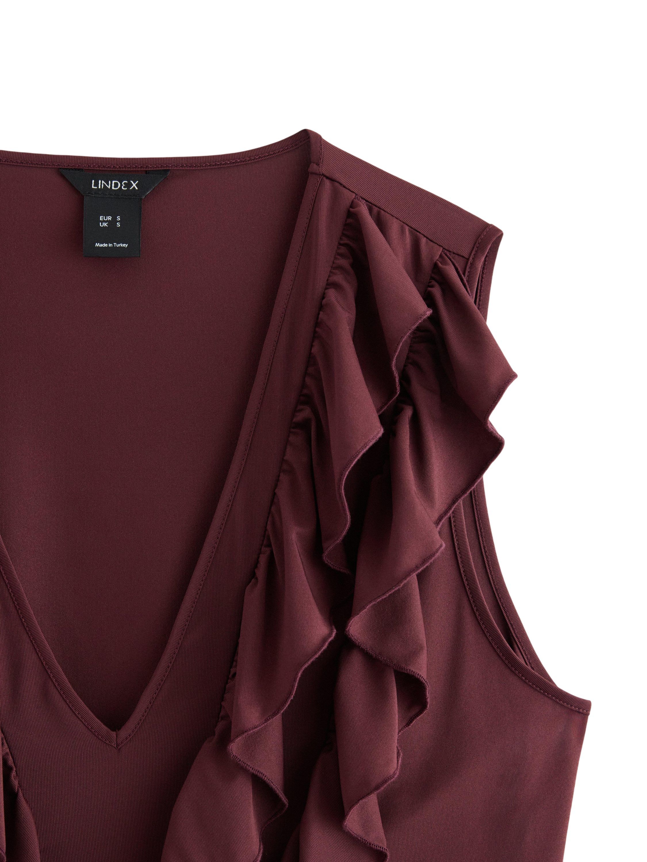 �rml&ouml;s topp i mjuk trik&aring; med vol