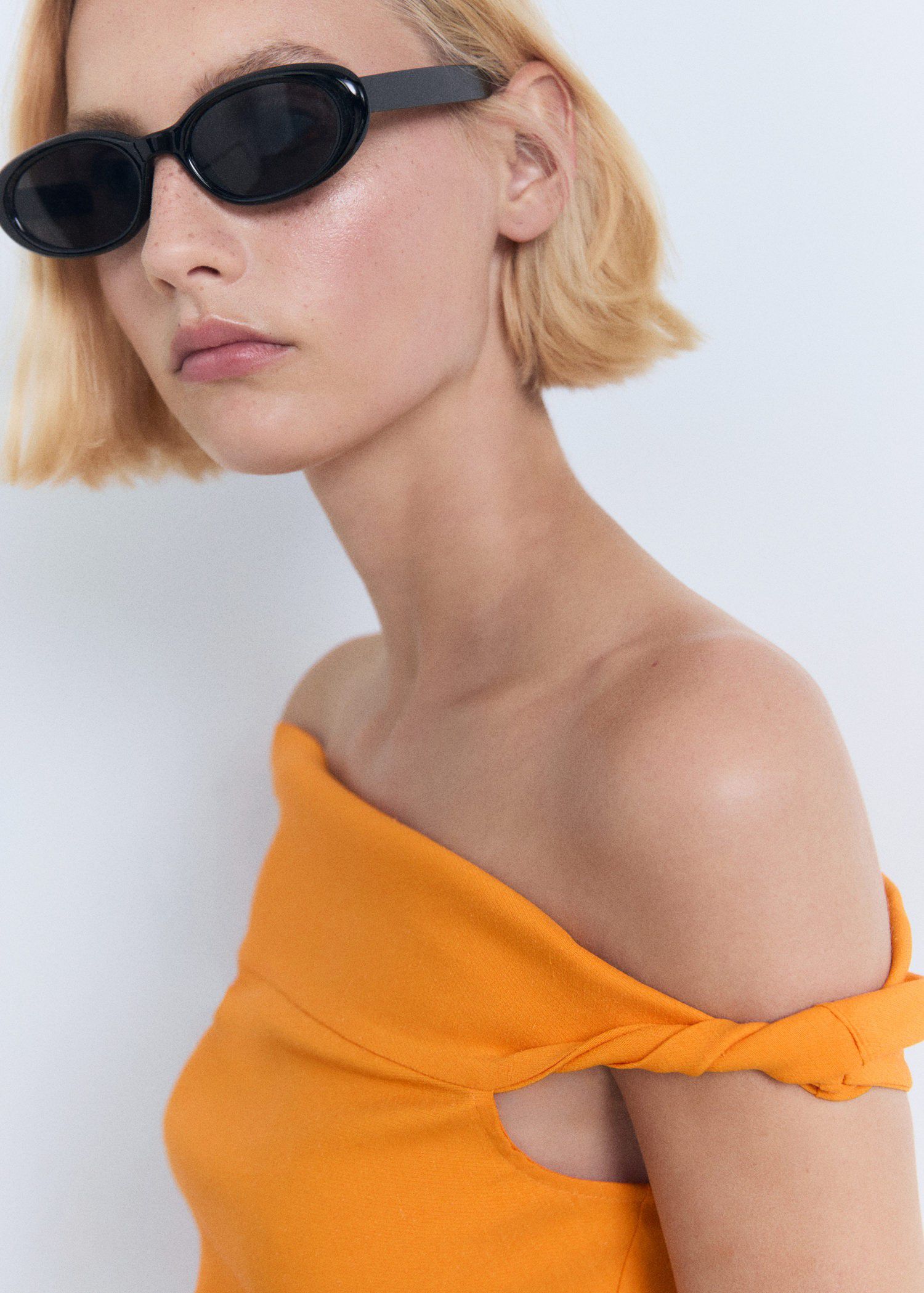 Asymmetrical strapless top