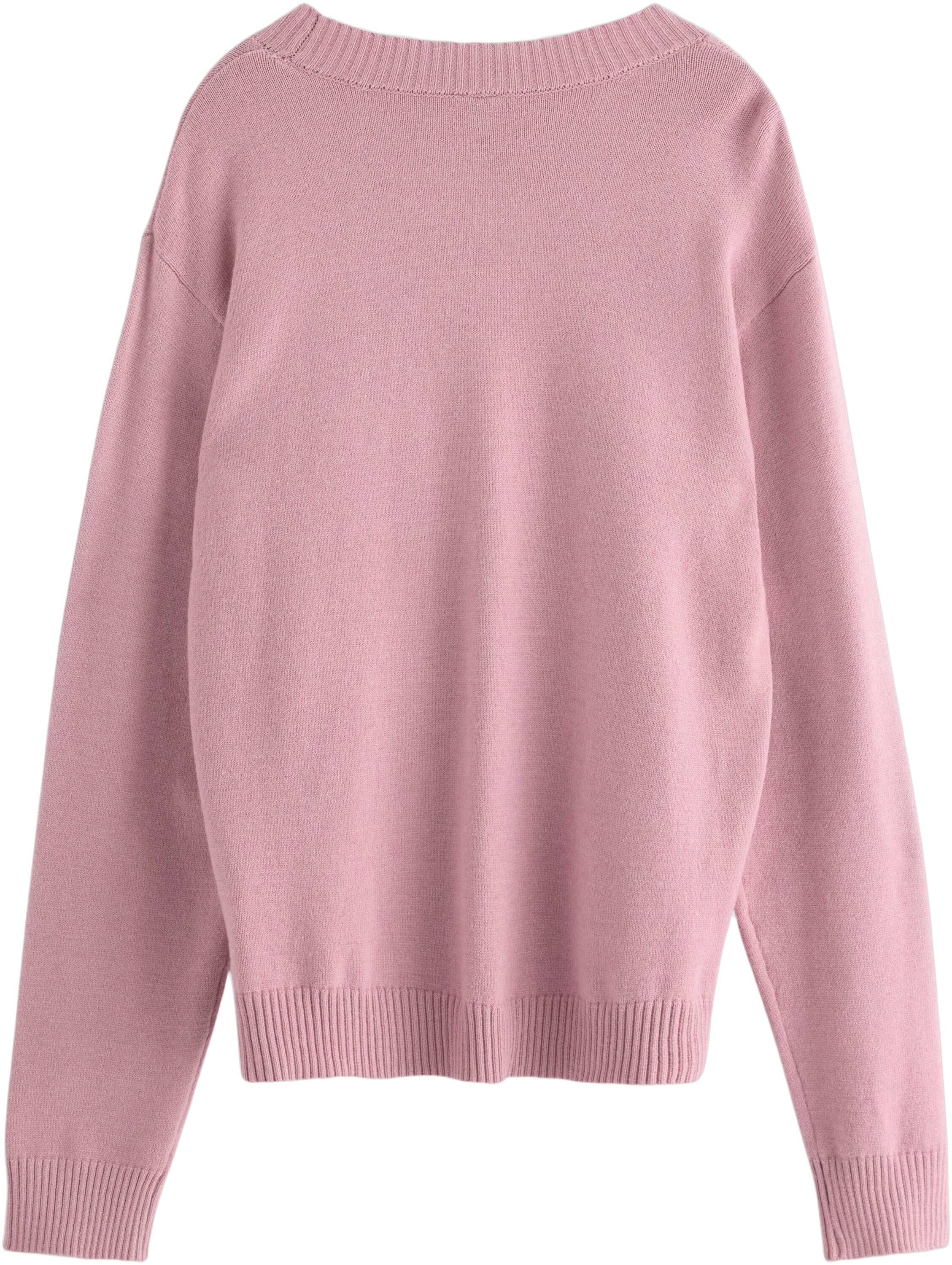 Sweater knitted placement inta