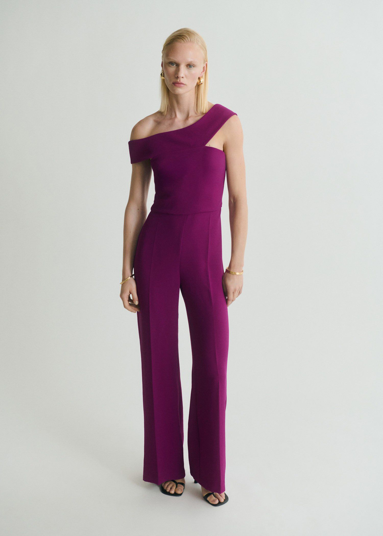 Long jumpsuit with asymmetrical nec