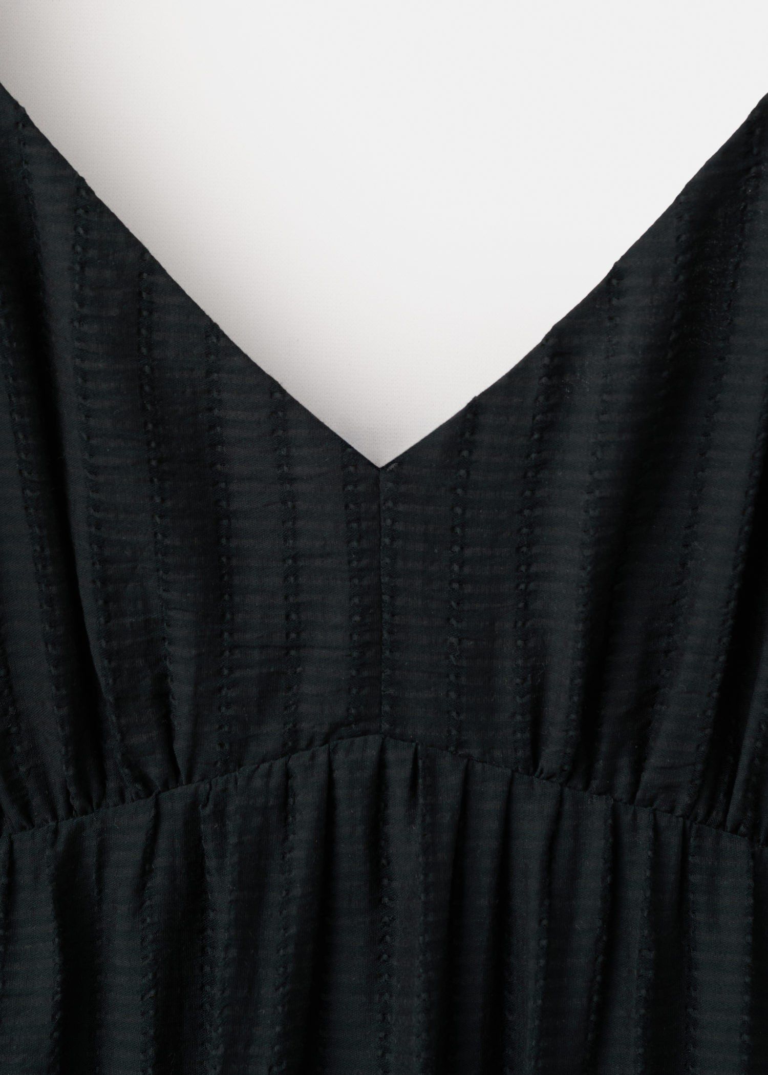 Textured dress with ruched detail