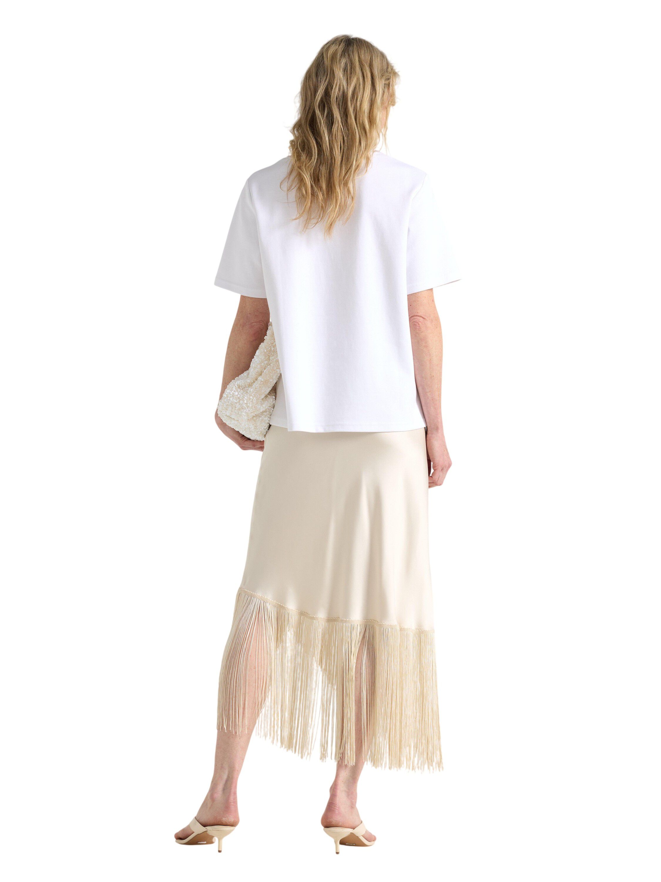 Satin skirt with fringe details.