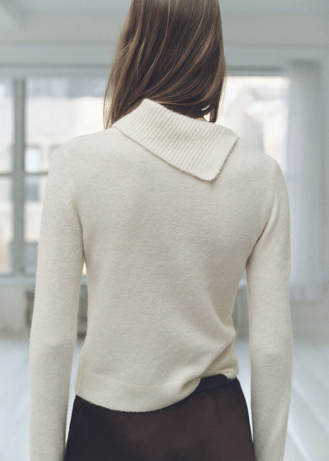 Sweater with wraparound lapel neck