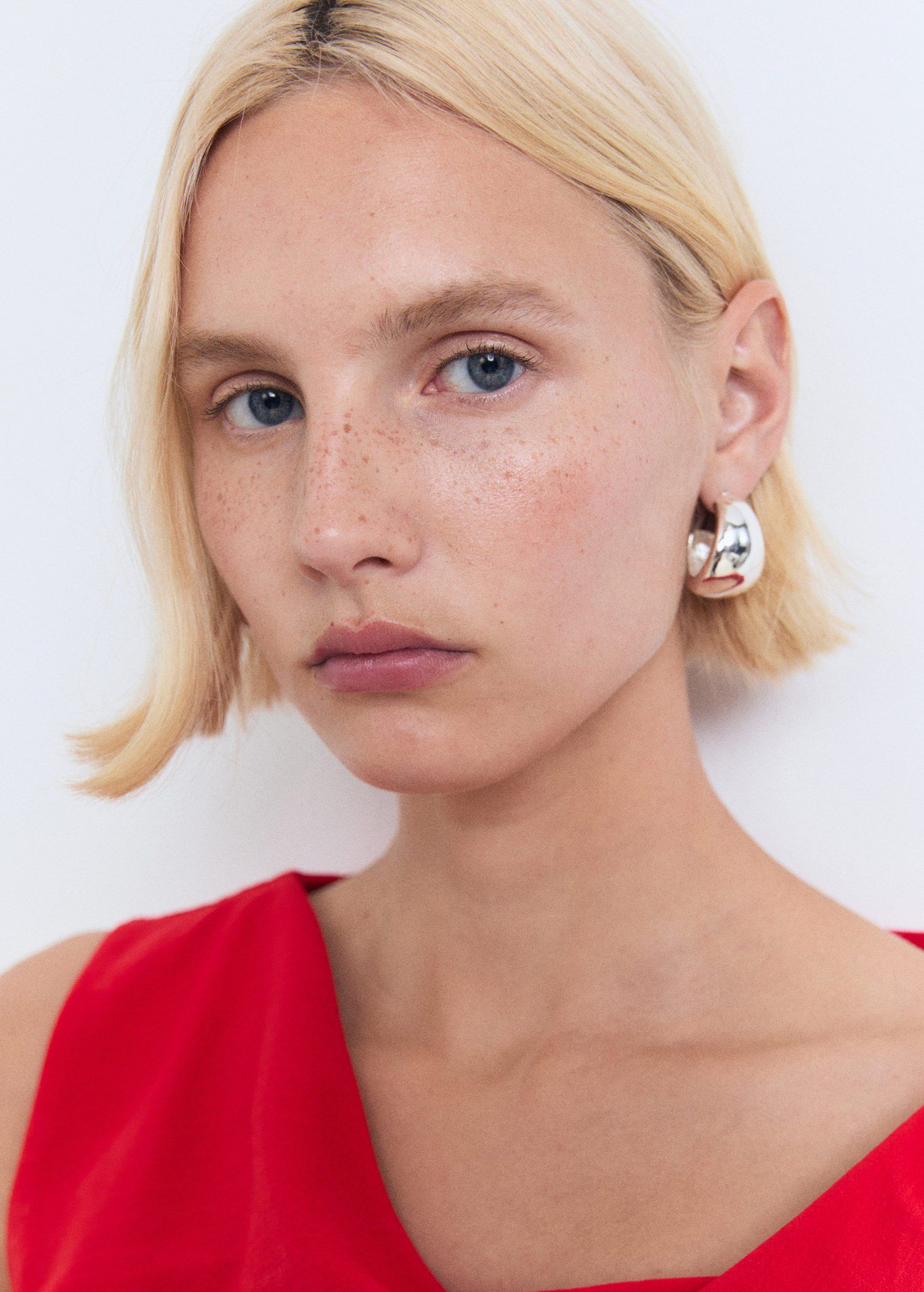 Asymmetrical draped top with straps