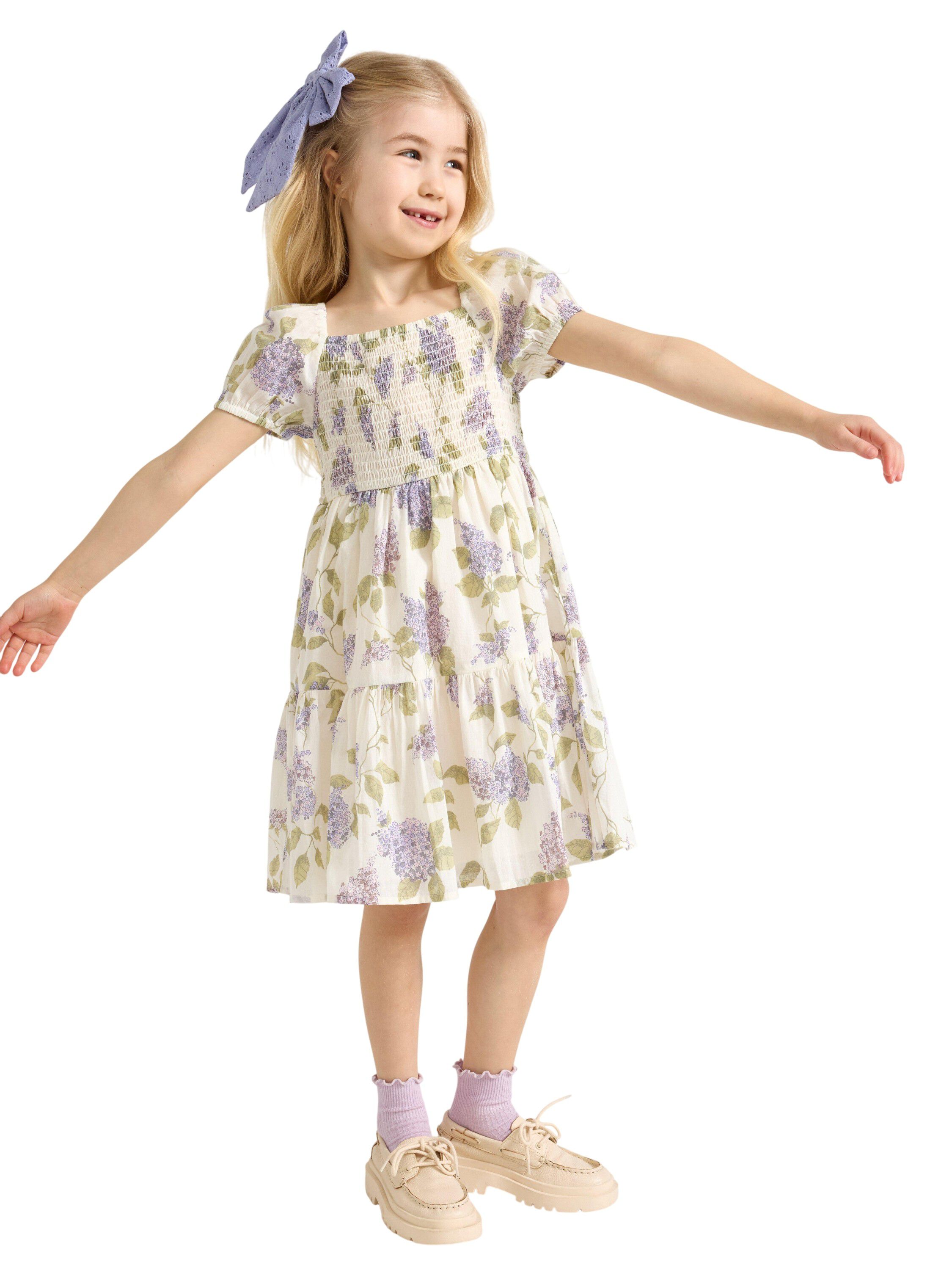 Dress with smock at the top and a s