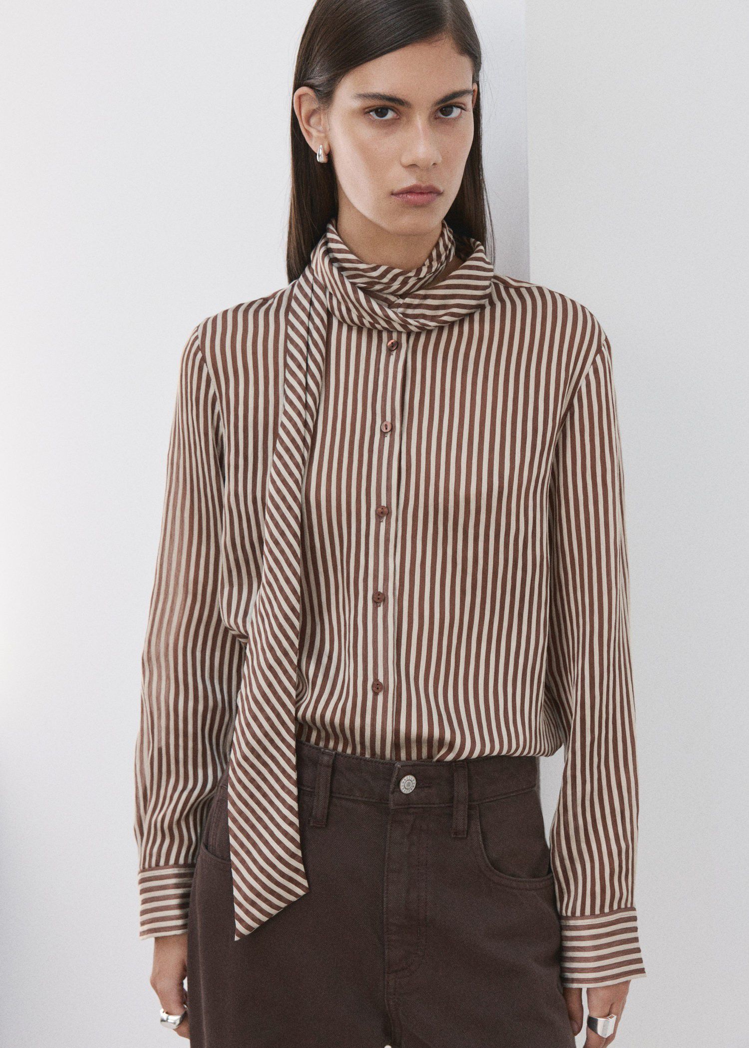 Striped blouse with bow tie neck