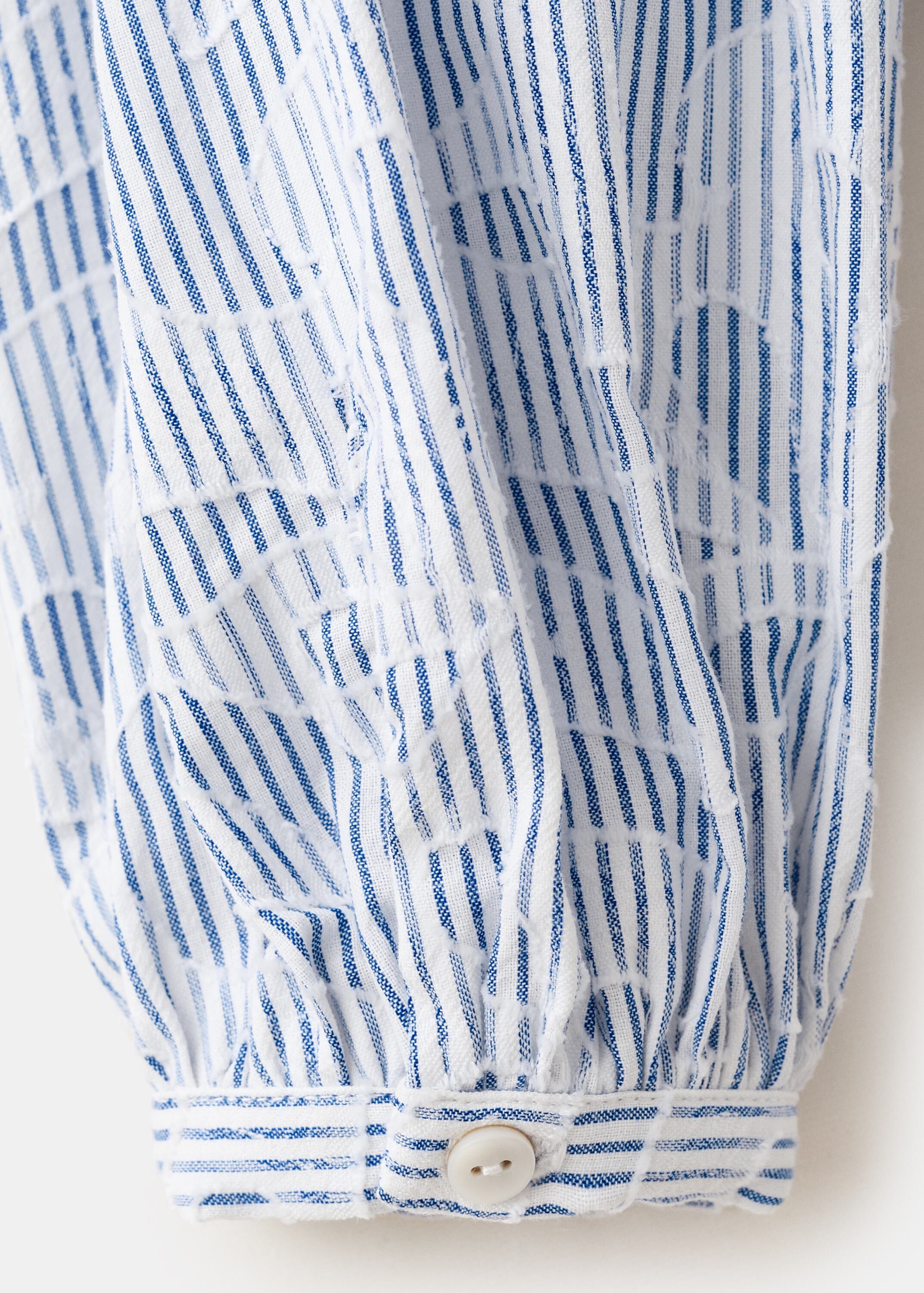 Striped shirt with embroidered deta