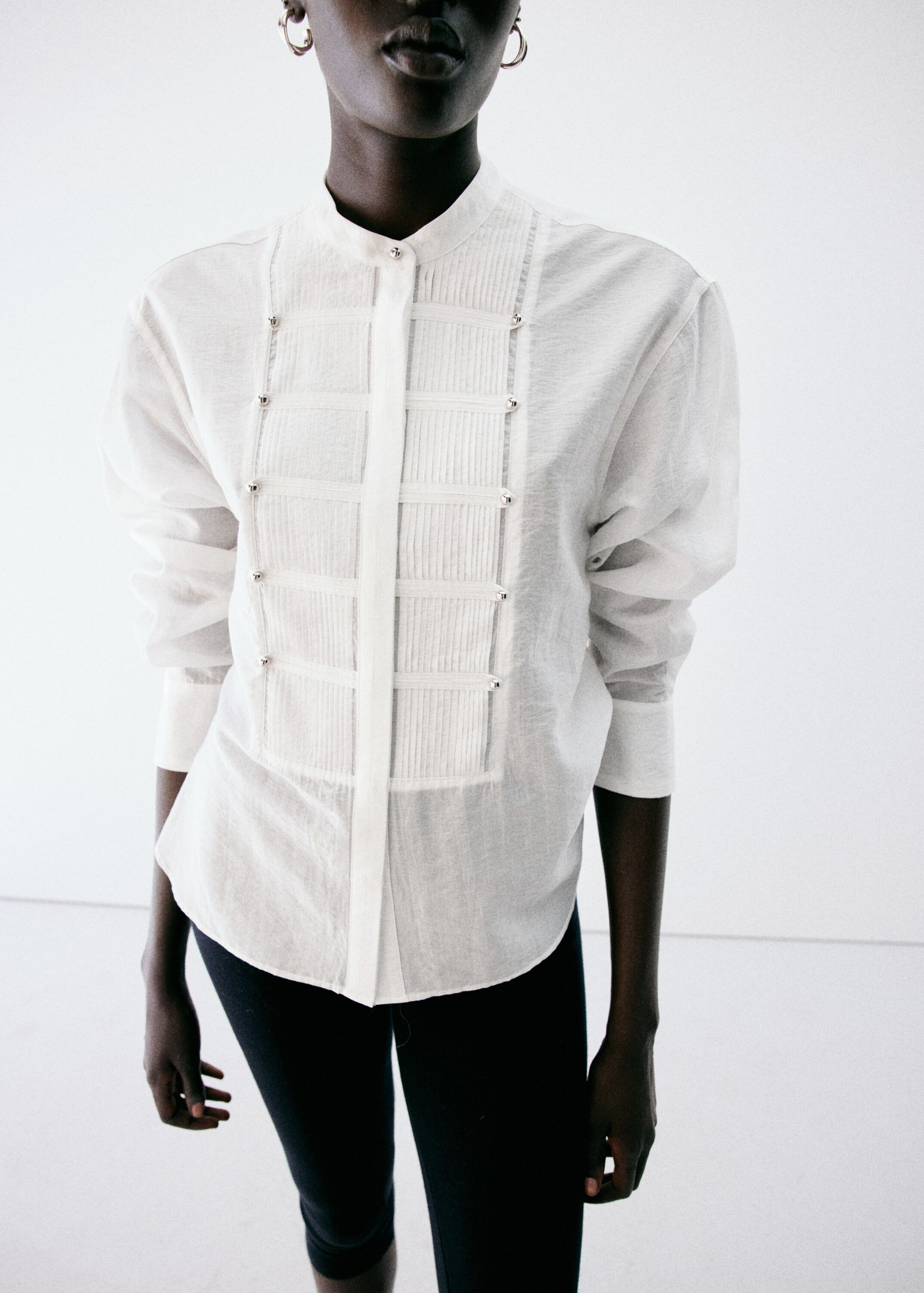 Shirt with pintuck detailing and bu
