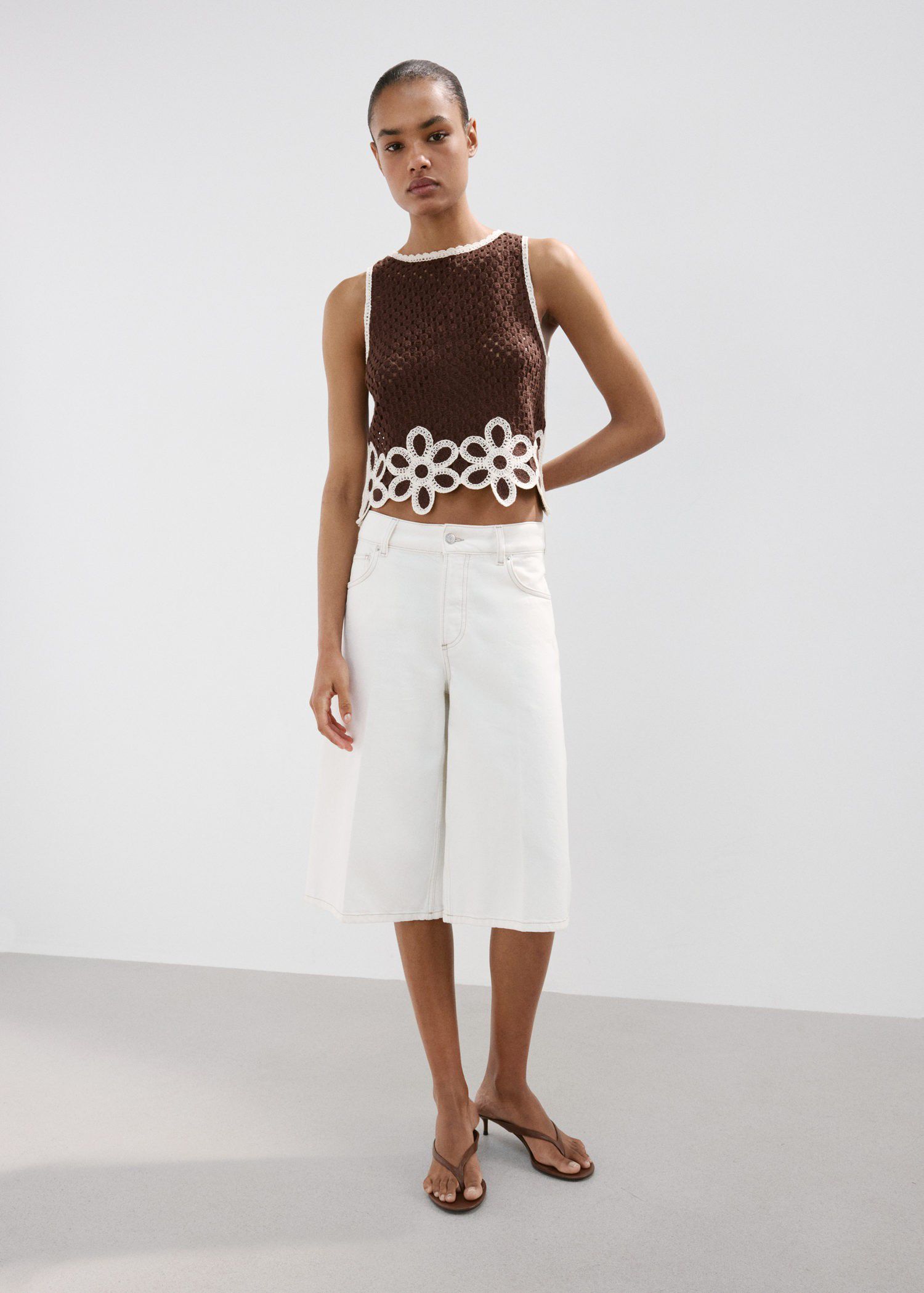 Floral-embroidered crochet top
