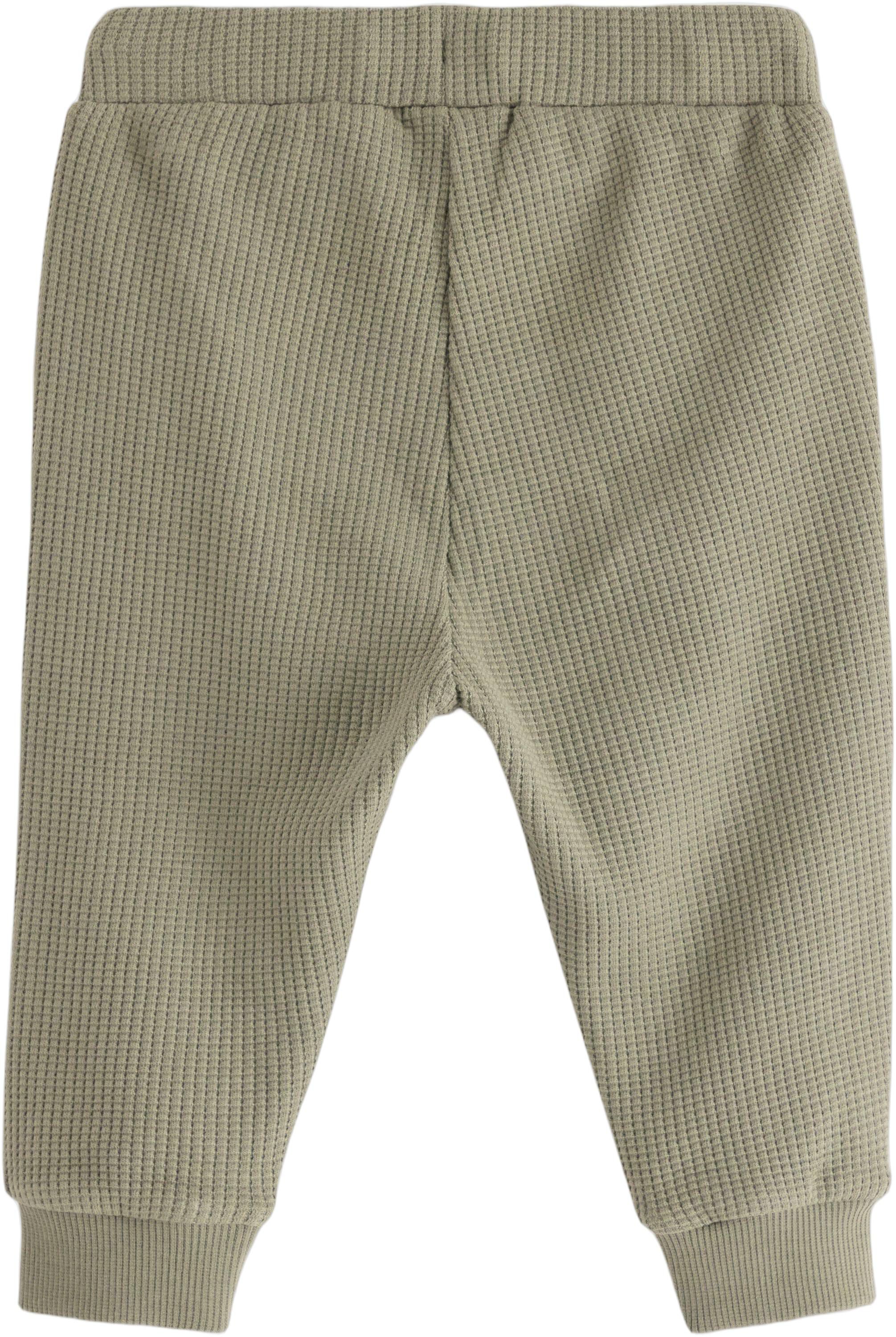 Joggers in waffled cotton with appl