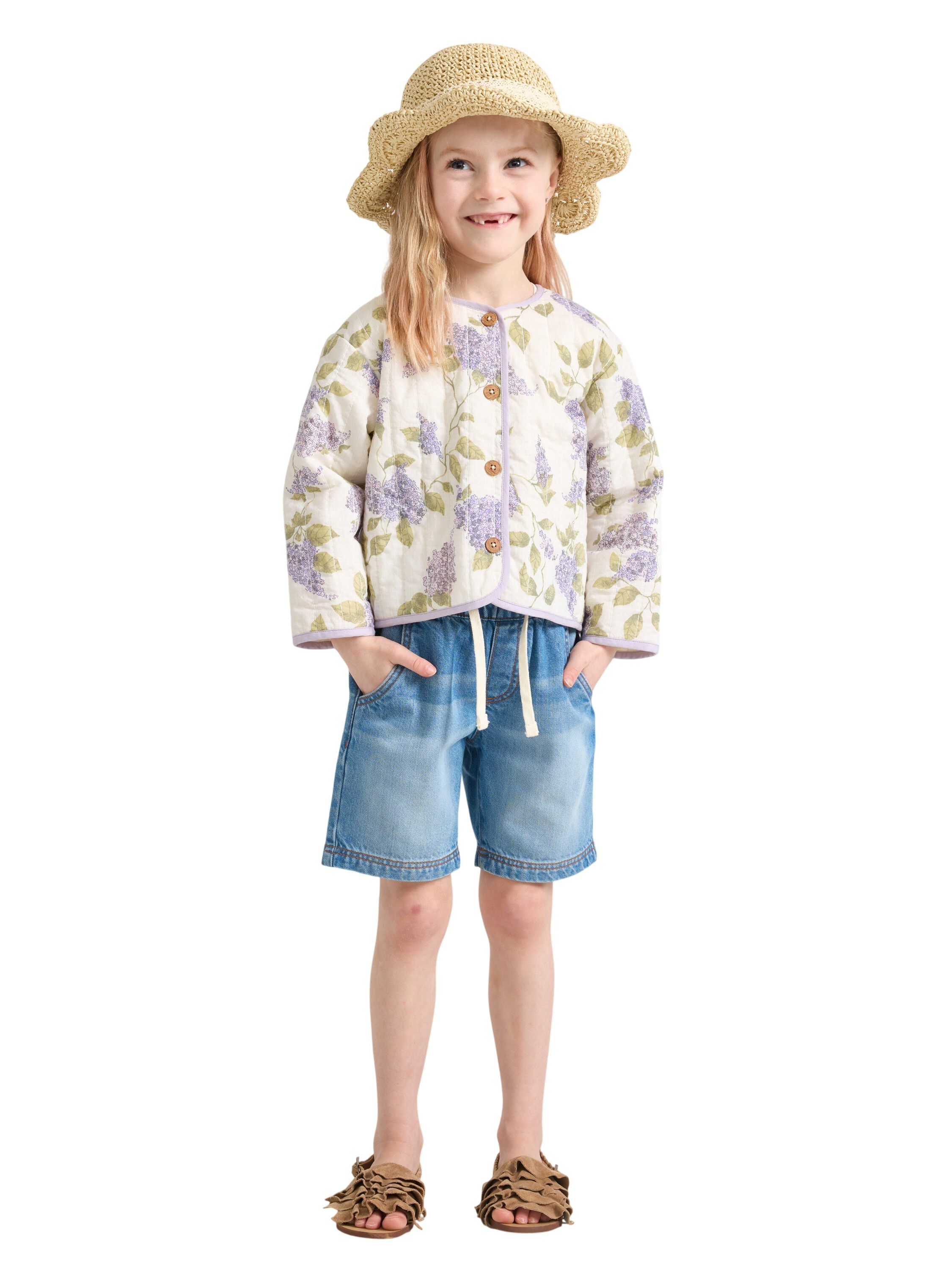 Jacket in quilted material with but