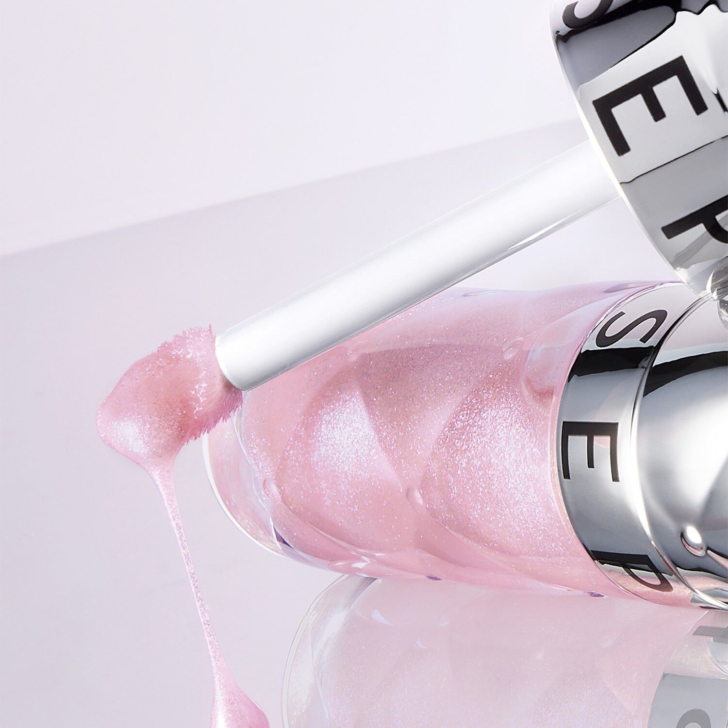 OUTRAGEOUS PLUMPING LIP GLOSS DUO - Med en nyans i begr&auml;nsad upplaga