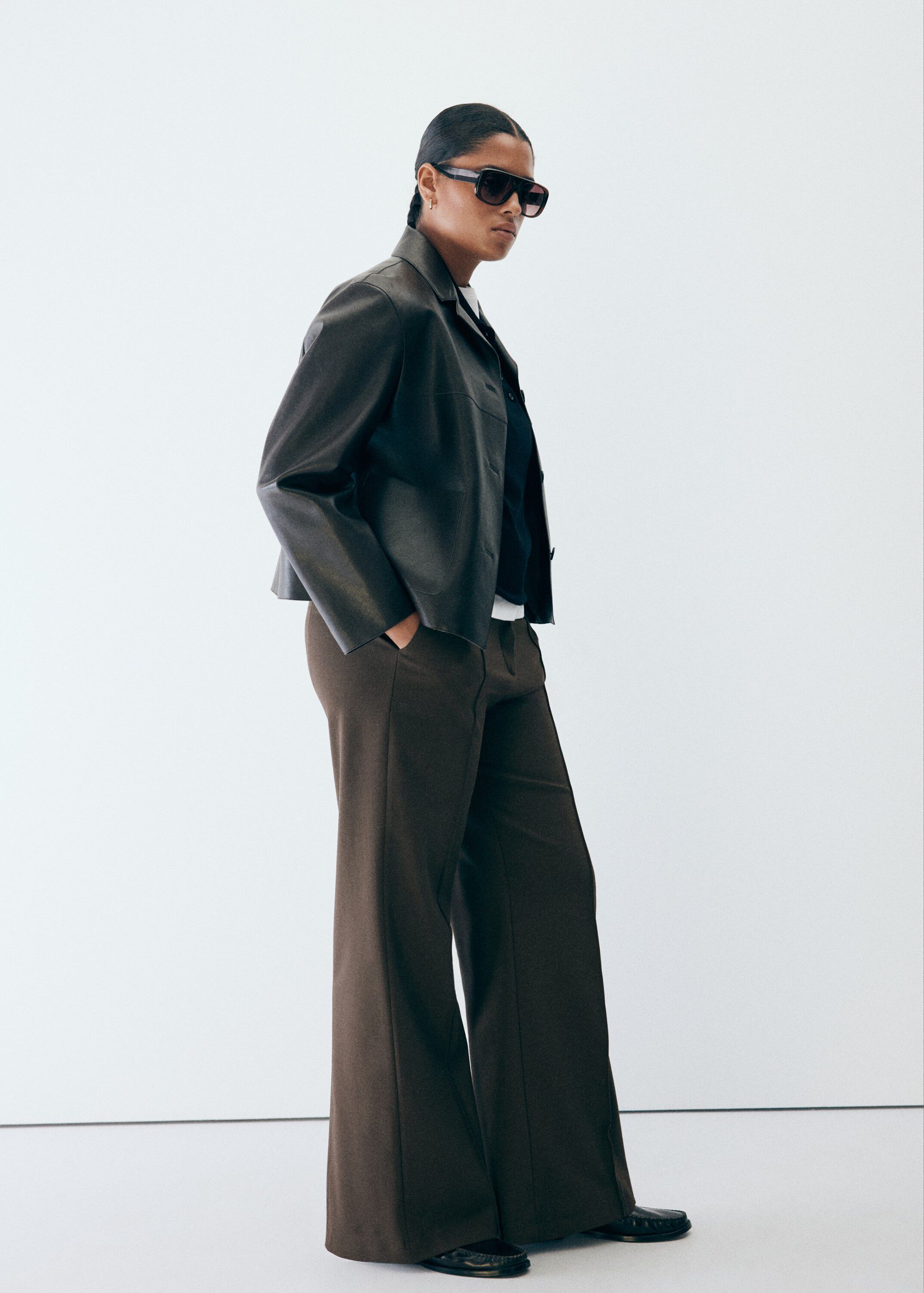 Flared trousers with seams